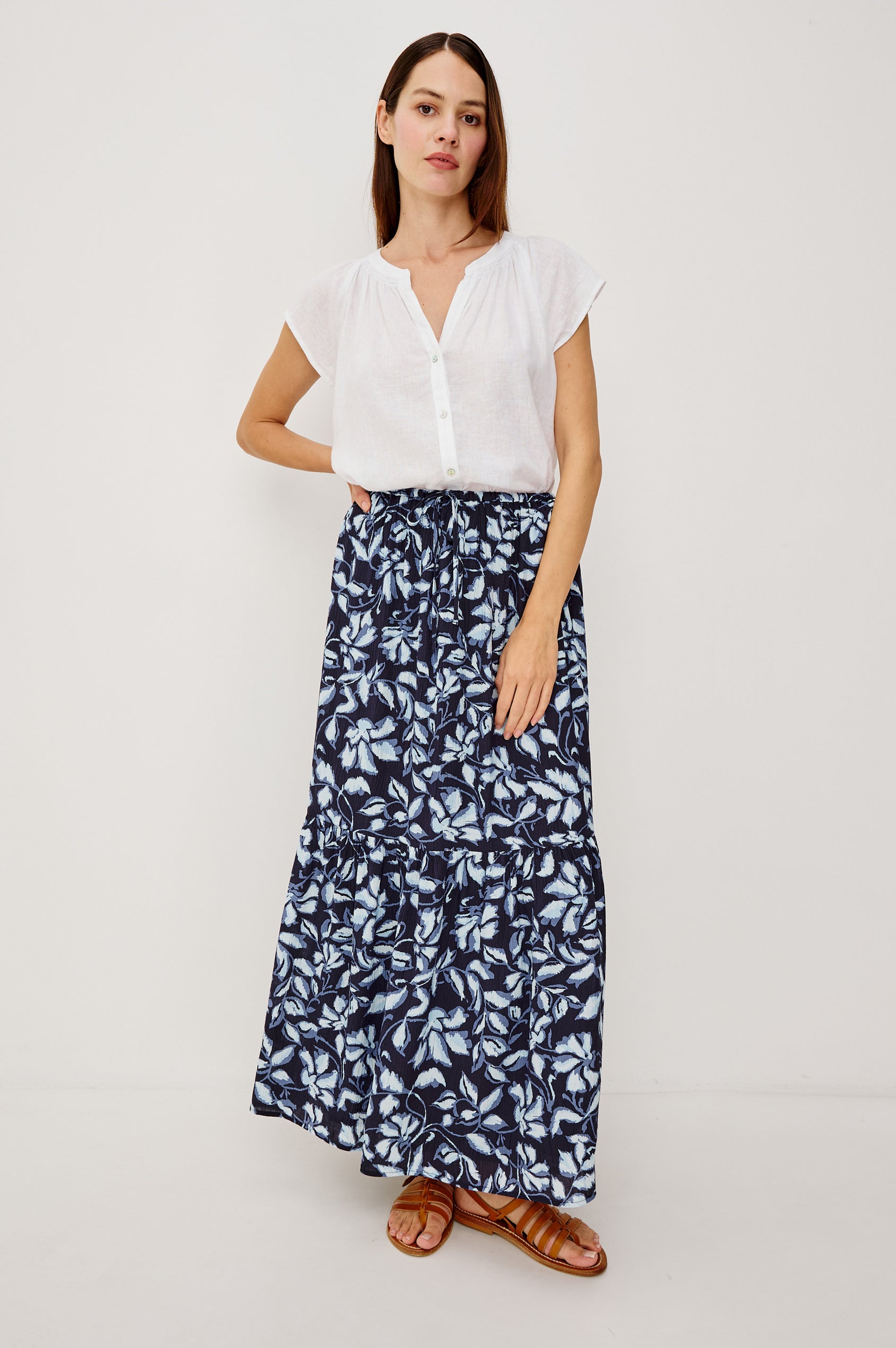 Marulo High-Waisted Floral Maxi Skirt in Pleated Chiffon With Adjustable Drawstring Ties, Single Tier Seam, and Full Interior Lining in Navy Jasmine Colorway - Full Body Front VIew Featured on Model