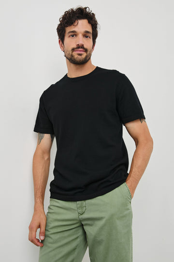 Mason Cotton Cashmere Short Sleeve T-Shirt with a Crew Neck in Black Colorway - Front View Featured on Model