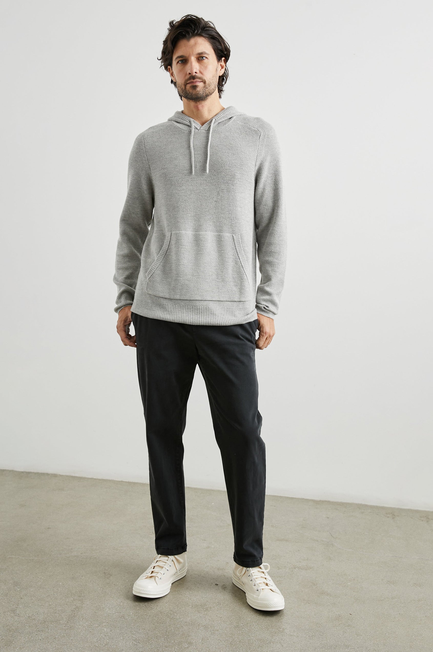 Matador Hoodie with Drawstring ties and a Kangaroo Pocket in Grey Heather Colorway - Front Full Body View Featured on Model