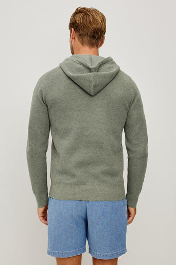 Matador Hoodie Sweatshirt in Cotton Blend With Drawstring TIes, Front Kangaroo Pockets, and Long Sleeves in Sage Heather - Upper Body Back View Featured on Model