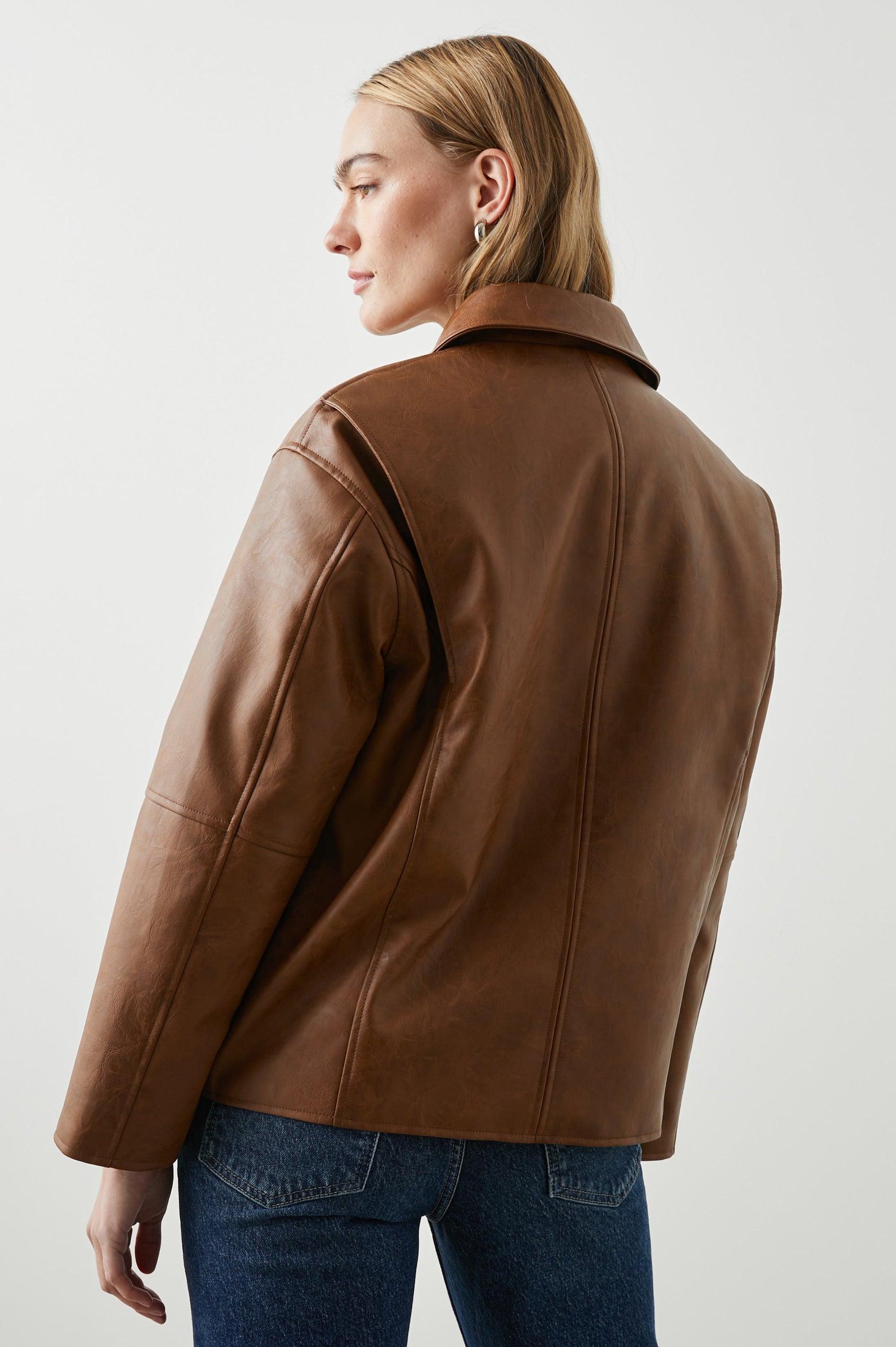 Mathis Faux Leather Jacket with Snap Closure and Two Front Snap Flap Pockets in Russet Colorway - Back View Featured on Model  