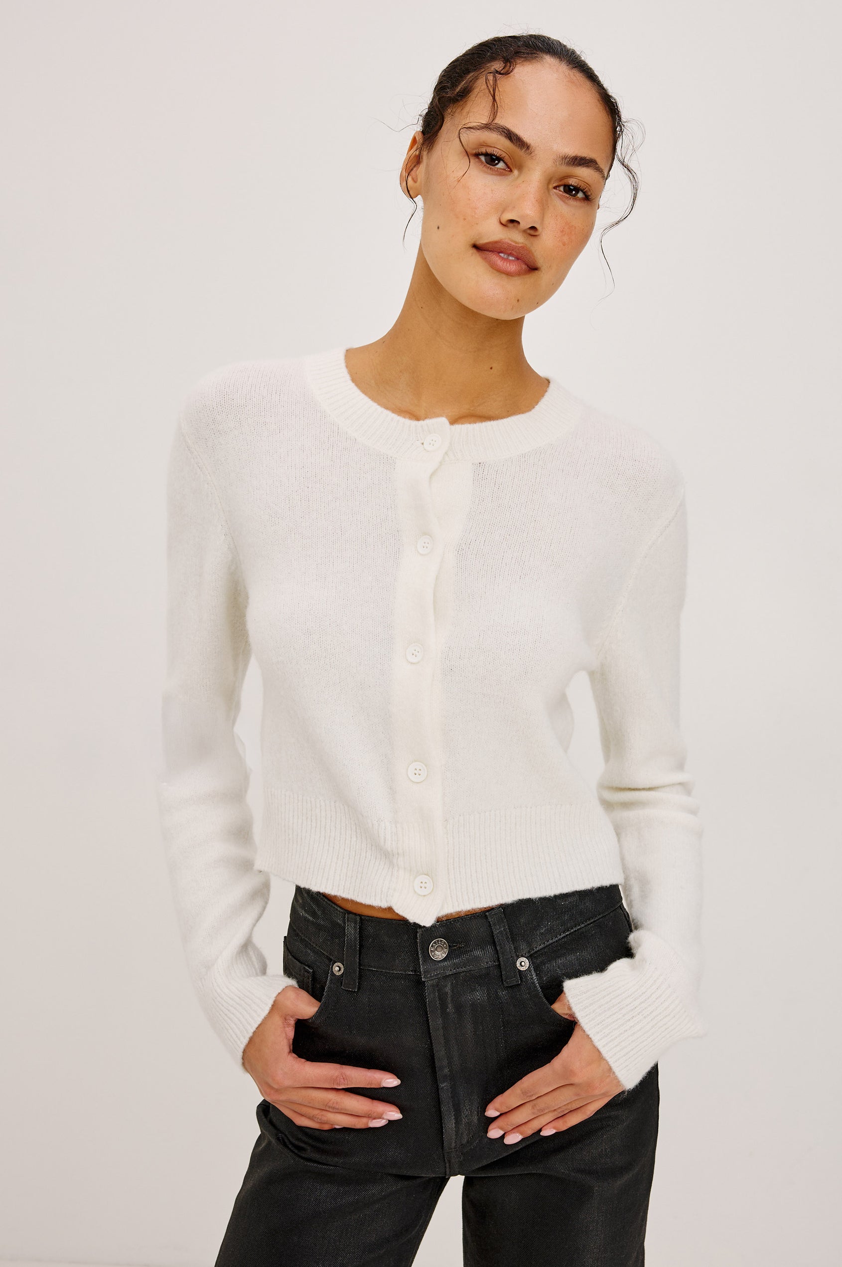Matilda Cardigan in Wool-Blend Knit WIth Relaxed Slightly Cropped Fit, Crew Neck, Front Buttons, and Ribbed Trim in Ivory Colorway - Upper Body Front View Featured on Model