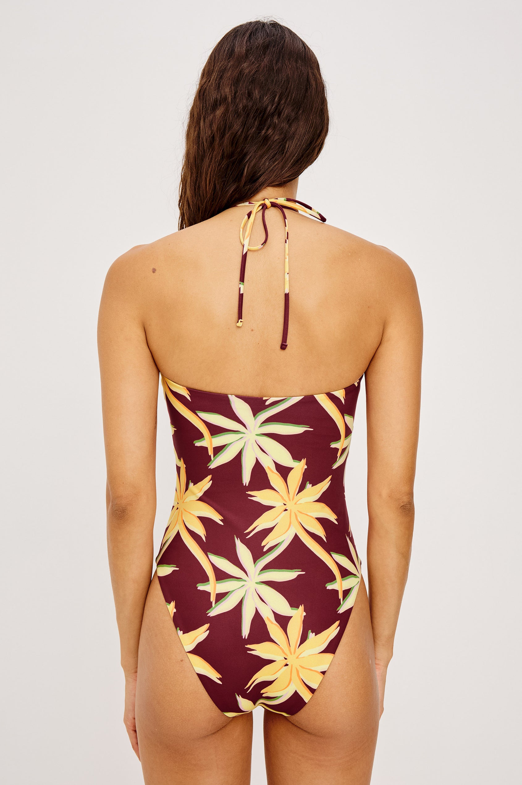 Maui One Piece Swimsuit With Adjustable Halter Chest Crisscross Ties, Ruched Keyhole Cut Out Bust, and Classic Rear Coverage in Red Palma Colorway - Upper Body Back View Featured on Model