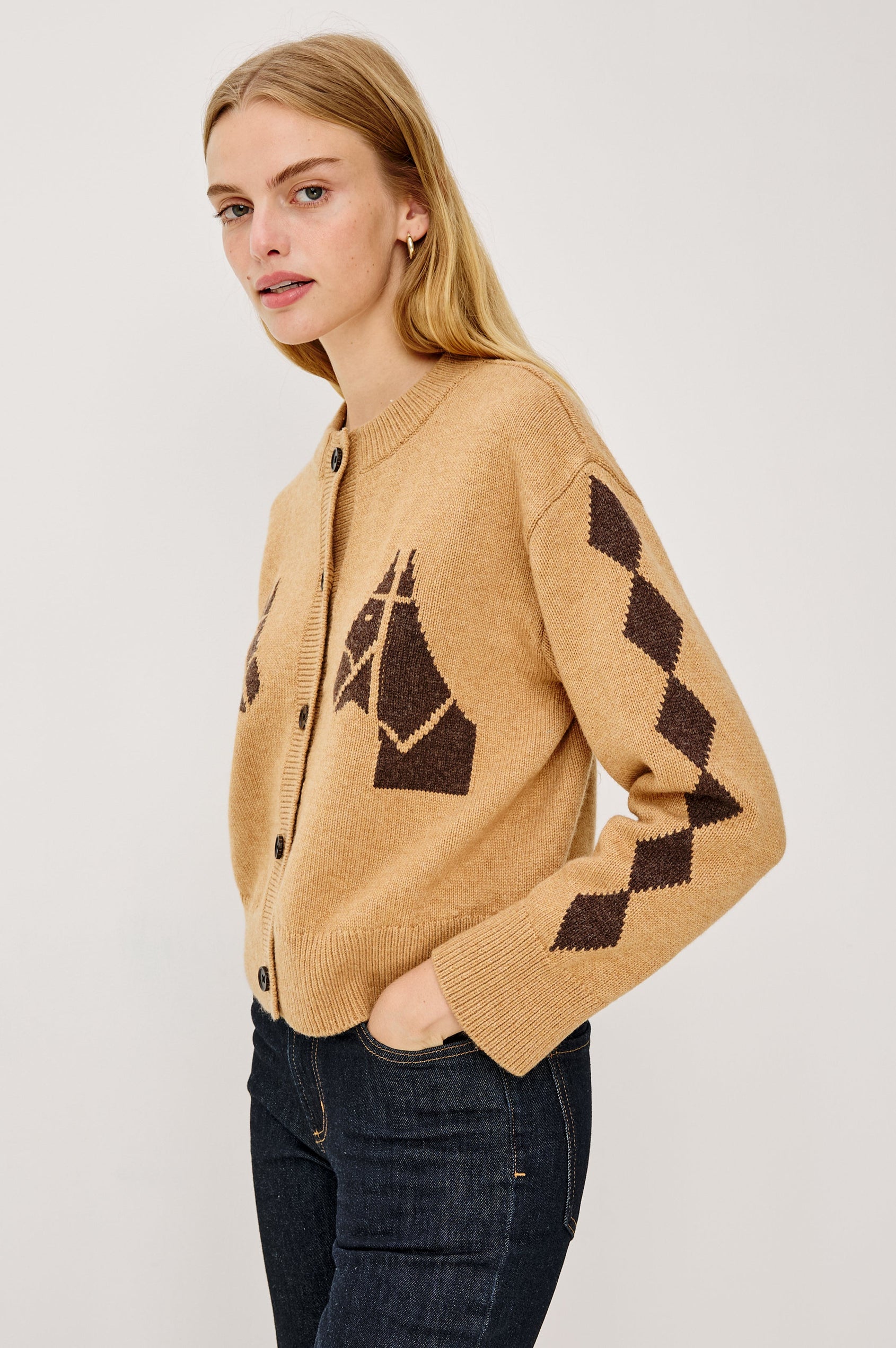 Mavie Long-Sleeve Cardigan with Button Closure, Crew Neck and Ribbed Trim in Camel Stables Colorway with Black Horses and Diamonds on Camel - Side View Featured on Model
