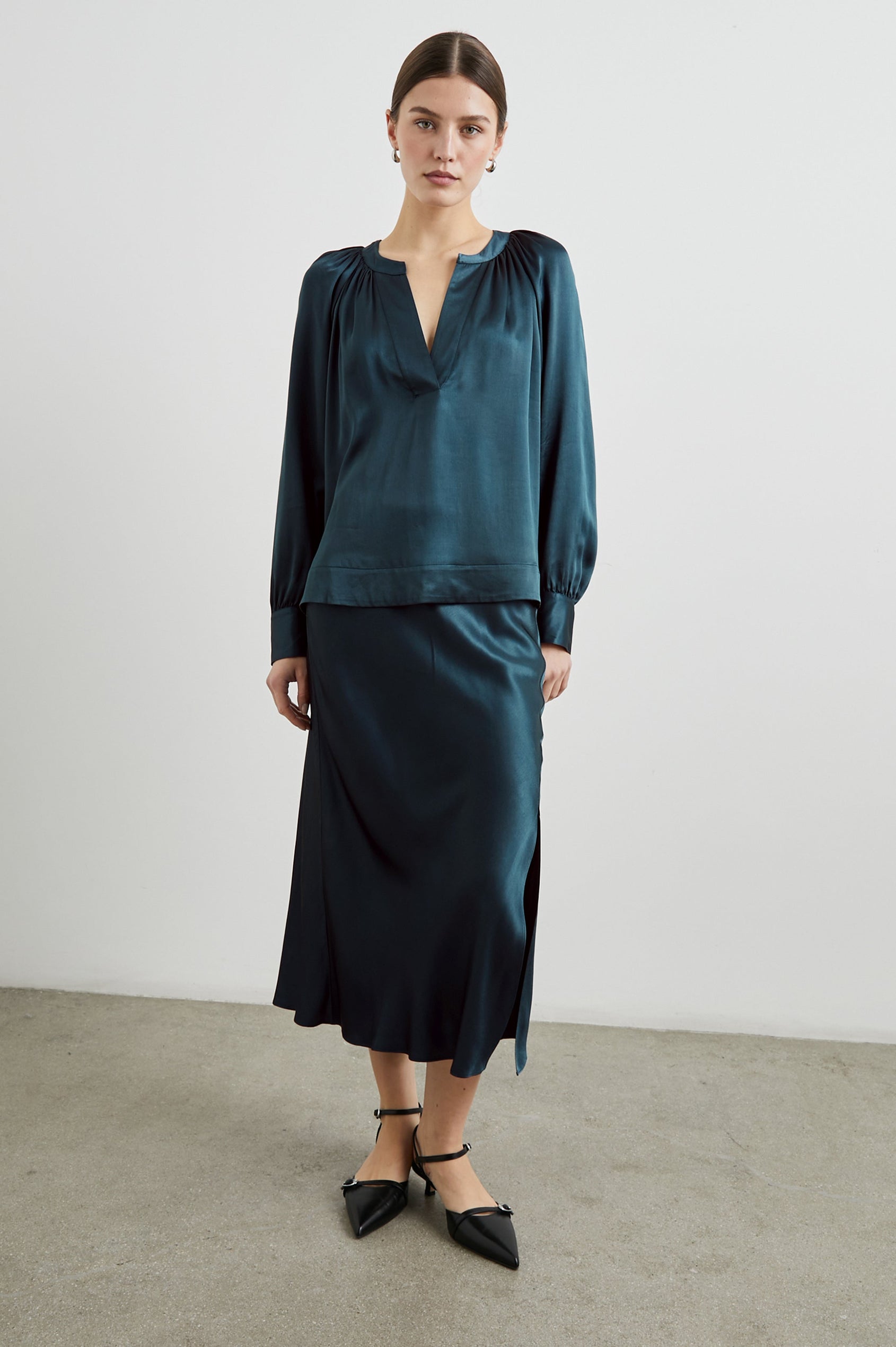 Maya Midi Skirt with Mid-Thigh Side Slit in Deep Sea Colorway - Front Full Body View Featured on Model
