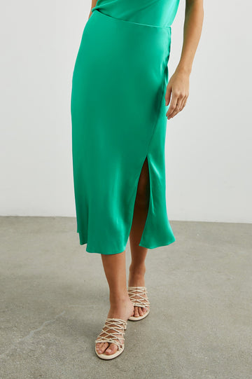 Maya Midi Skirt with Mid-Thigh Side Slit in Jade Colorway - Front View Featured on Model