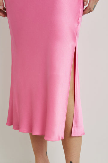 Maya Midi Skirt with Mid-Thigh Side Slit in Malibu Pink Colorway - Front View Featured on Model