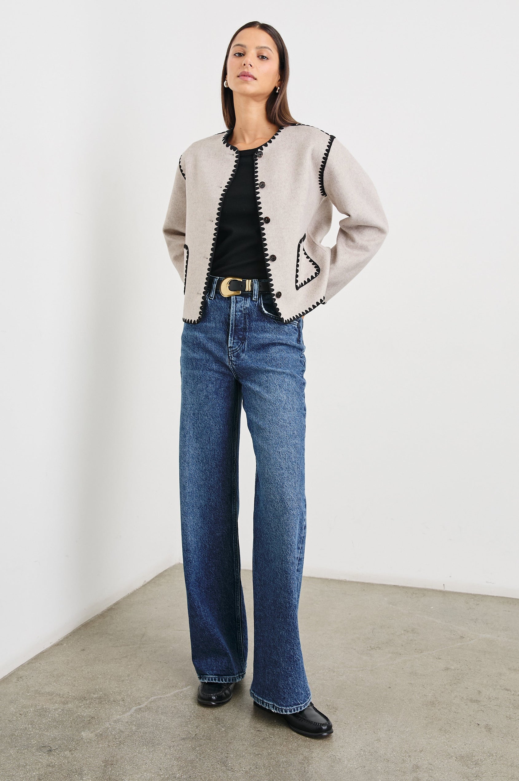 Melanie Jacket with Button Closure and Two Front Patch Pockets in Oatmeal Colorway, with Black Stitching along the Trim and Pockets - Front Full Body View Featured on Model