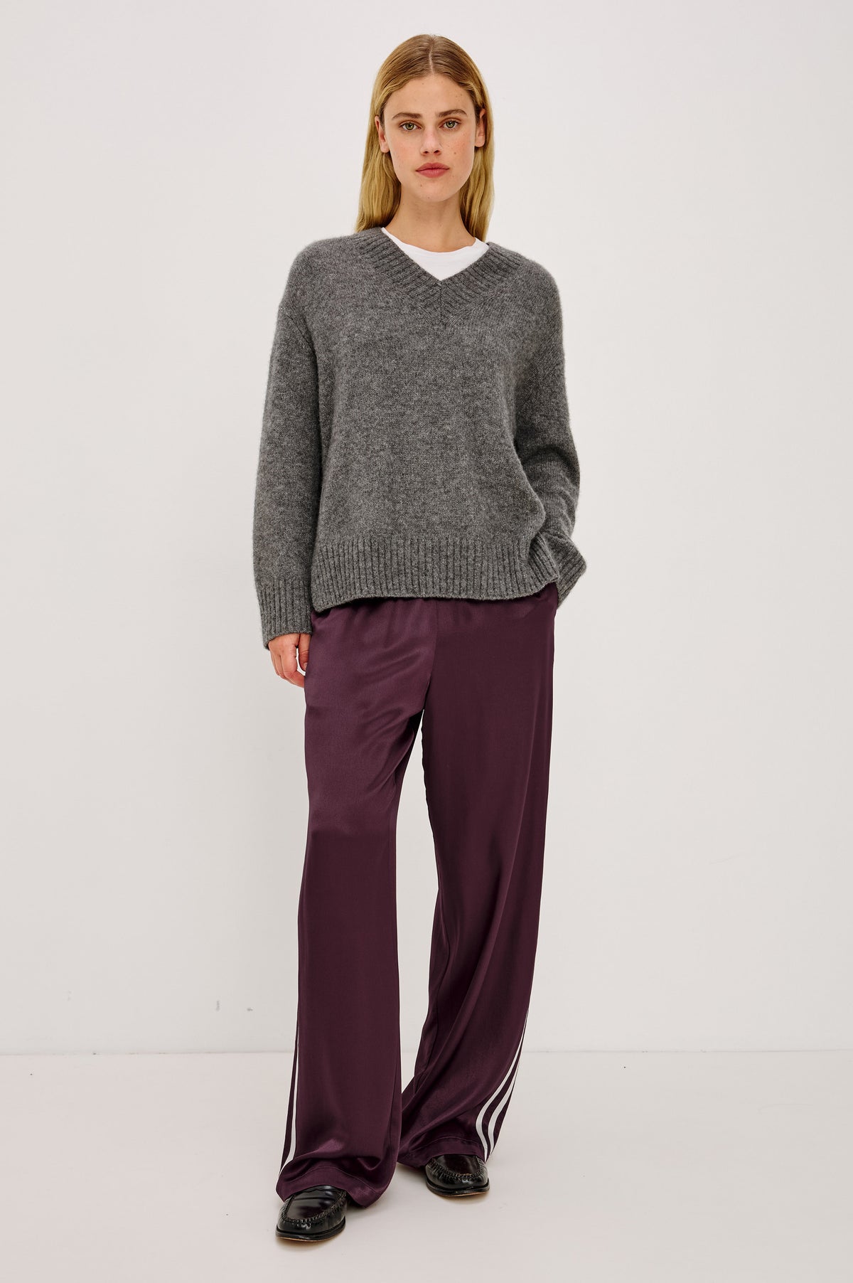 Merida Pant in Satin Back Crepe With Elastic Waistband, Side Pockets, and Wide Legs With Double Side Stripes in Wine Colorway - Full Body Front View Featured on Model