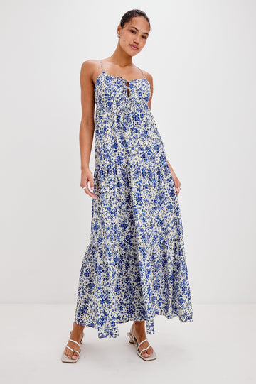 Mica Midi Tank Dress with and Empire Waist, Spaghetti Straps, a Keyhole at Center Front, Ties and a Tiered Skirt in Blue Marguerite Colorway. Front View Shown on Model.