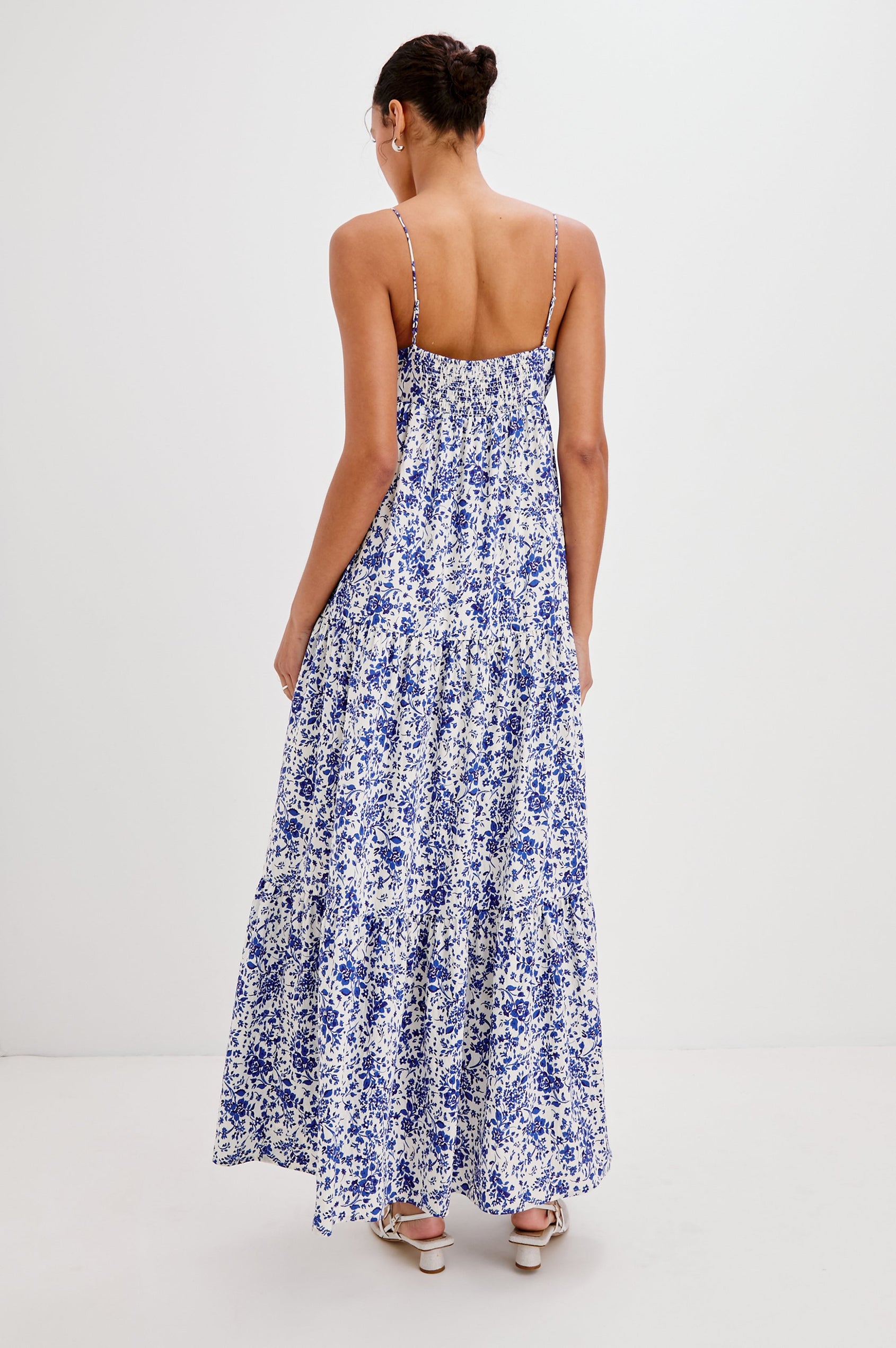 Mica Midi Tank Dress with Spaghetti Straps, a Keyhole at Center Front, Ties and a Tiered Skirt in Blue Marguerite Colorway. Back View Shown on Model.
