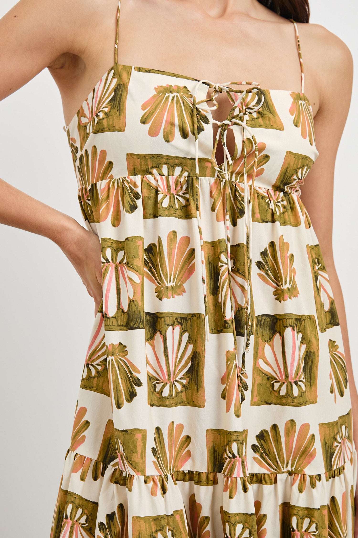 Mica Midi Tank Dress with and Empire Waist, Spaghetti Straps, a Keyhole at Center Front, Ties and a Tiered Skirt in Checkered Shells Colorway. Front View Shown on Model.