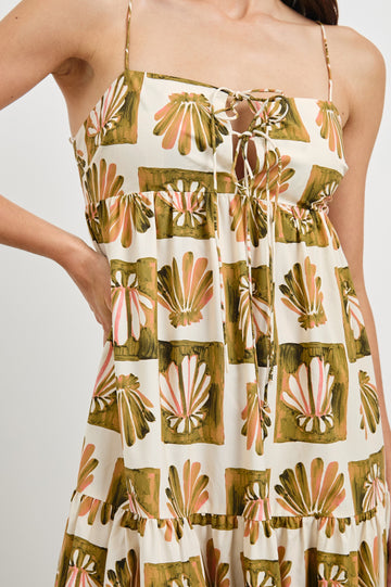 Mica Midi Tank Dress with and Empire Waist, Spaghetti Straps, a Keyhole at Center Front, Ties and a Tiered Skirt in Checkered Shells Colorway. Front View Shown on Model.