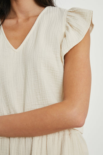 Miley Cropped, Short-Sleeve, V Neck Top with Flutter Sleeves and Textured Fabric in Flex Colorway - Front View Featured on Model