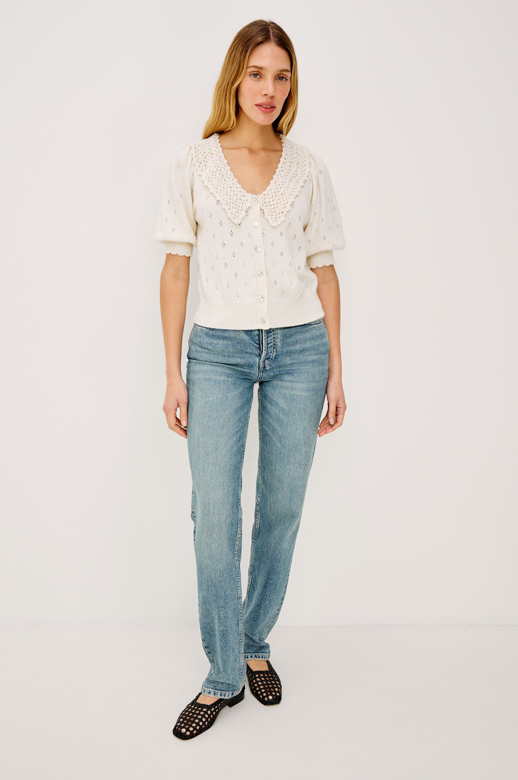 Mindy Cardigan Top in Cotton Wool Blend With Crochet Peter Pan Collar, Short Puff Sleeves, and Ribbed Trim in Ivory Colorway - Full Body Front View Featured on Model