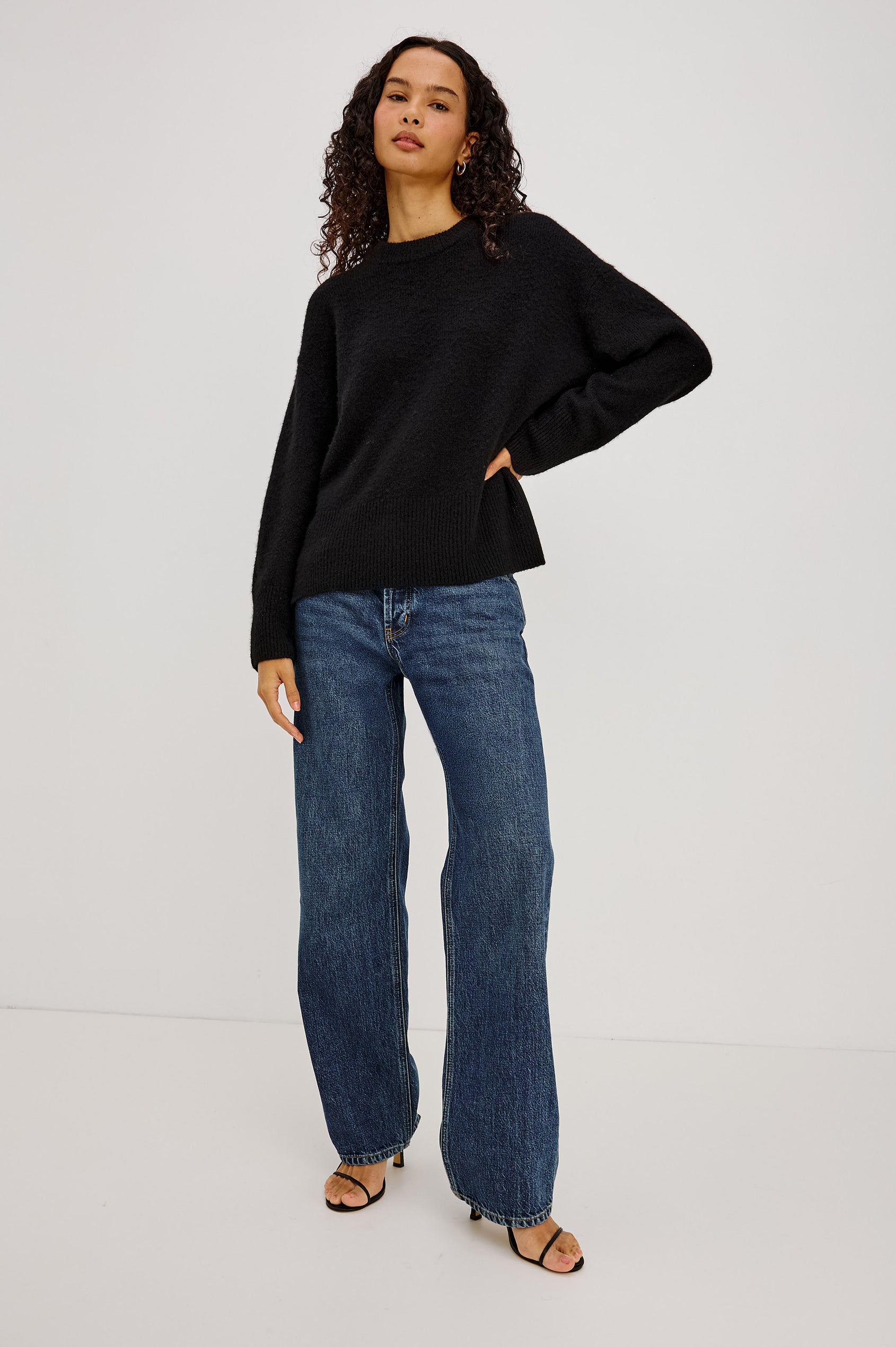 Giovanna Top in Soft Pointelle Cotton With Scoop Neck, Scalloped Trim, Ruffled Flutter Sleeves in Black Colorway - Full Body Front View Featured on Model