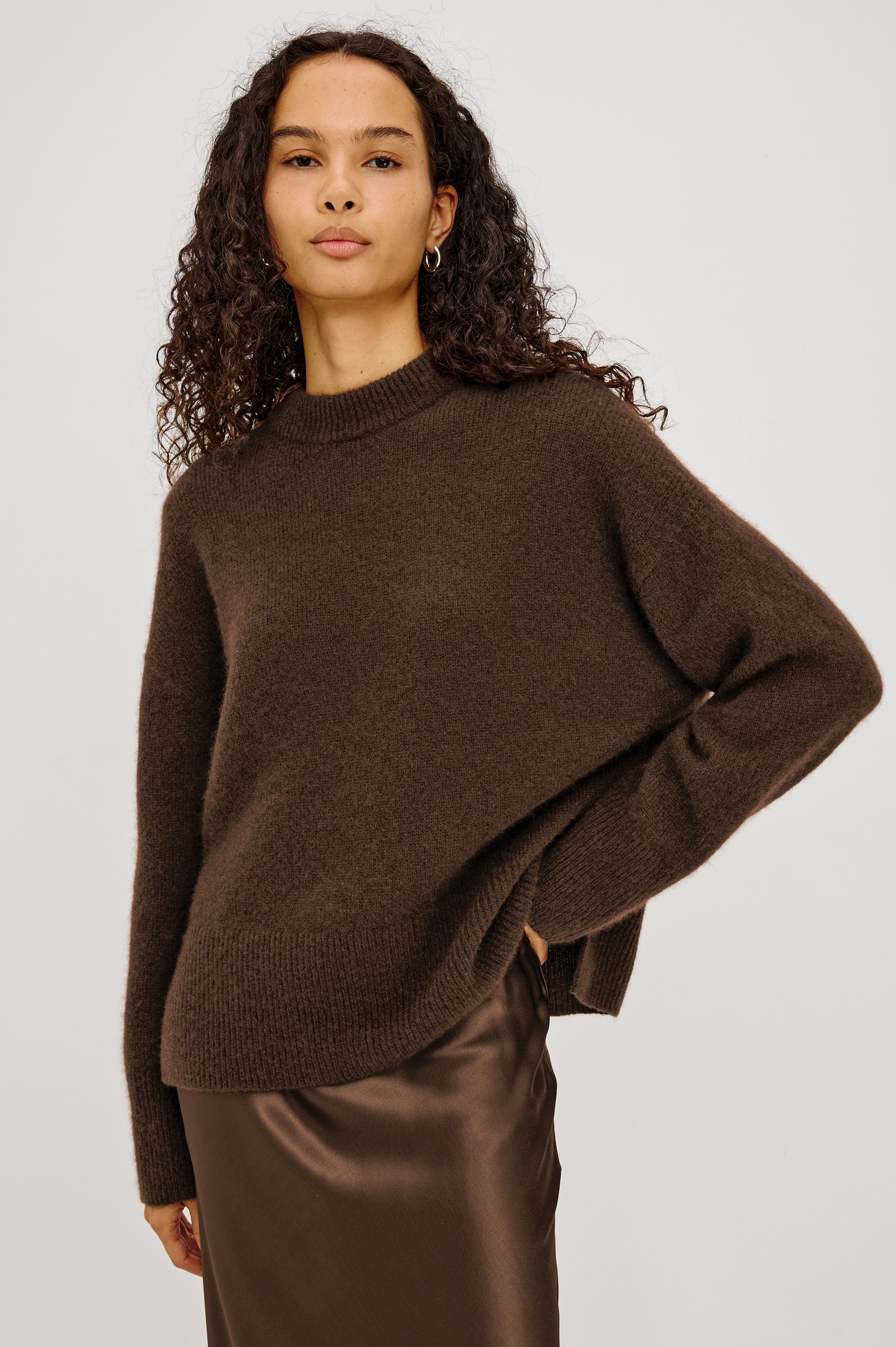 Miranda Sweater in Cashmere-Silk Blend With Relaxed Boxy Fit, Mock Neck, Drop Shoulders, and Side Slits at Hem in Chocolate Colorway - Upper Body Front View Featured on Model