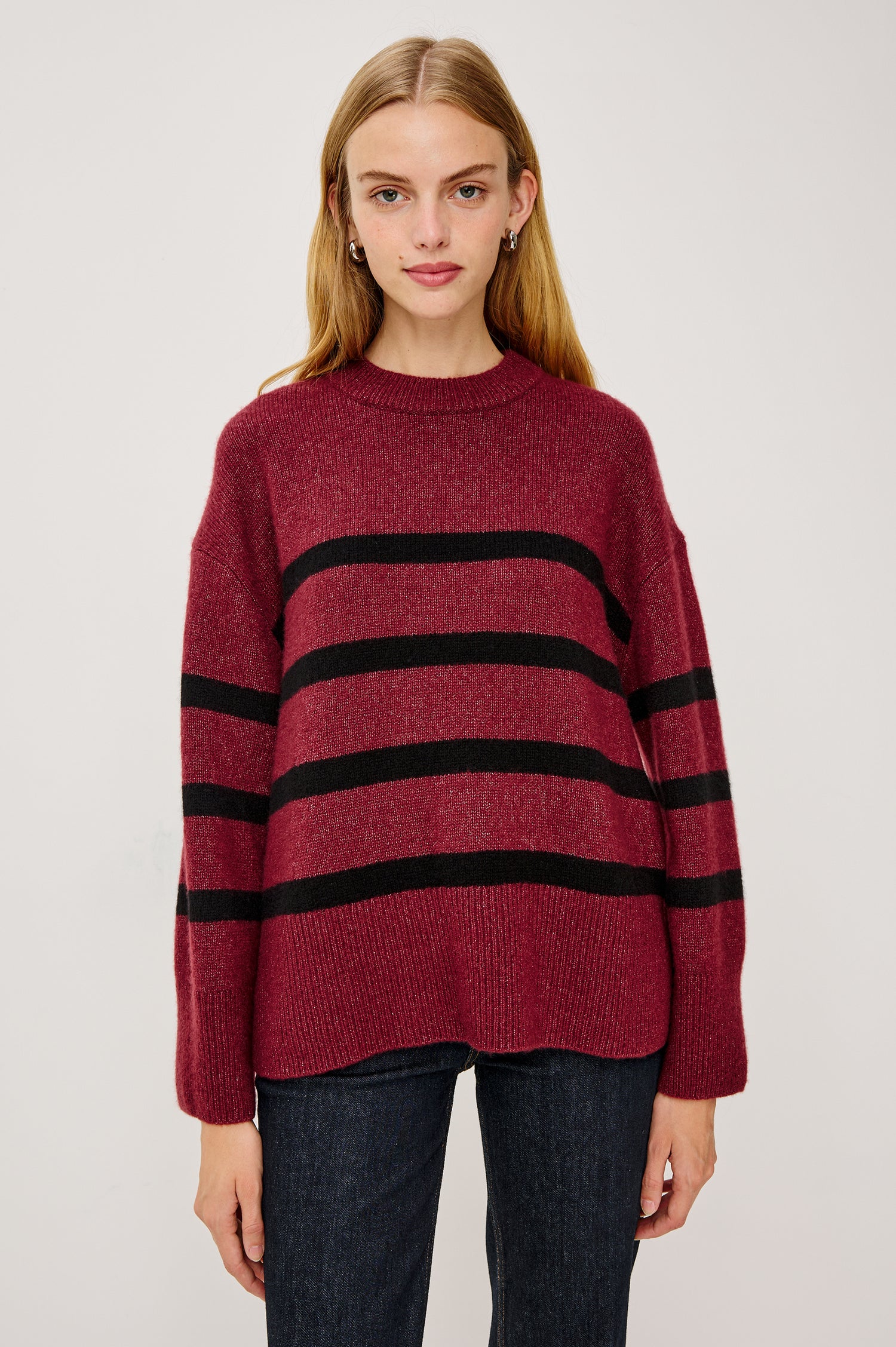 Miranda Sweater in Cashmere-Silk Blend With Crew Neckline, Ribbed Trim, Dropped Shoulders, Loose Relaxed Fit, and Long Sleeves in Garnet Black Stripe Colorway - Upper Body View Featured on Model