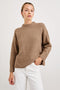 Miranda Long-Sleeve Sweater with a Mock Neck, Side Slits, and Ribbed Trim in Oatmeal Colorway - Front View Featured on Model