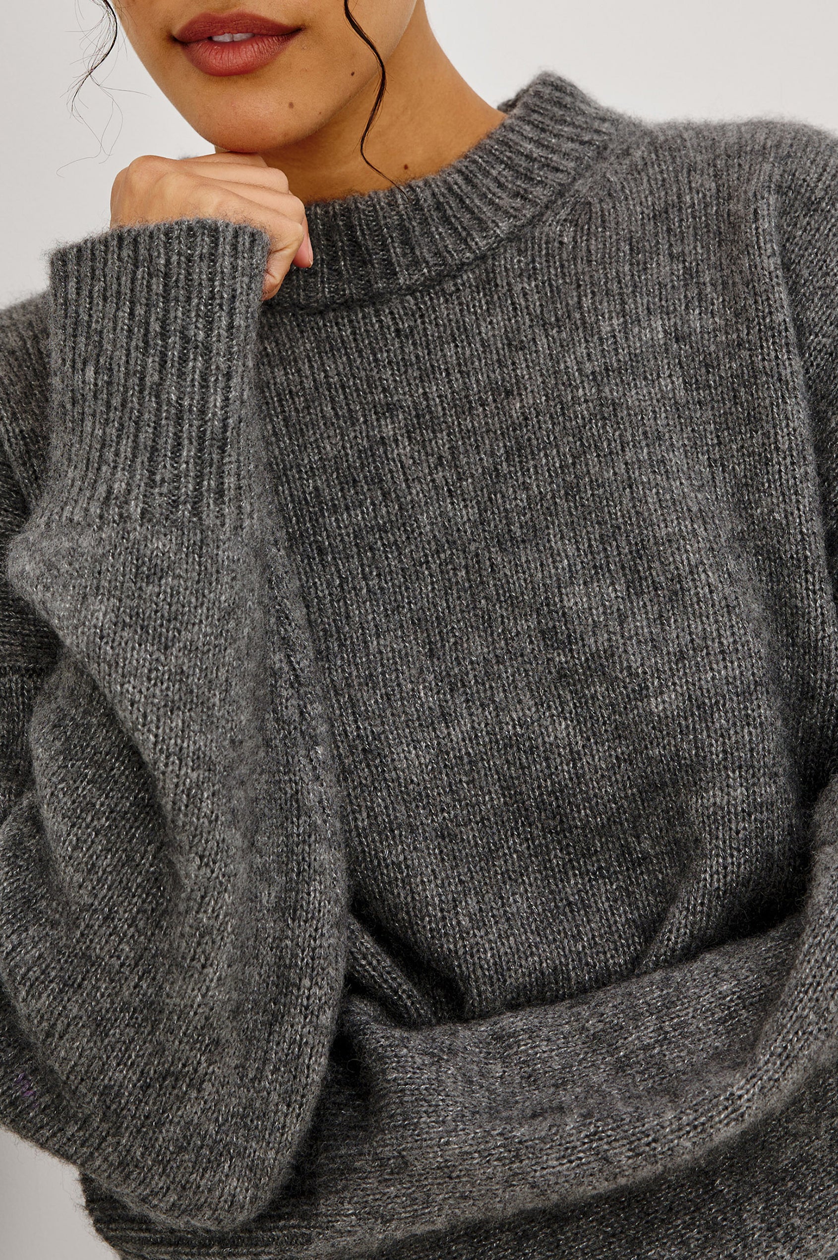 Miranda Sweater in Cashmere-Silk Blend With Relaxed Boxy Fit, Mock Neck, Drop Shoulders, and Side Slits at Hem in Thunder Colorway - Upper Body Close Up Front View Featured on Model