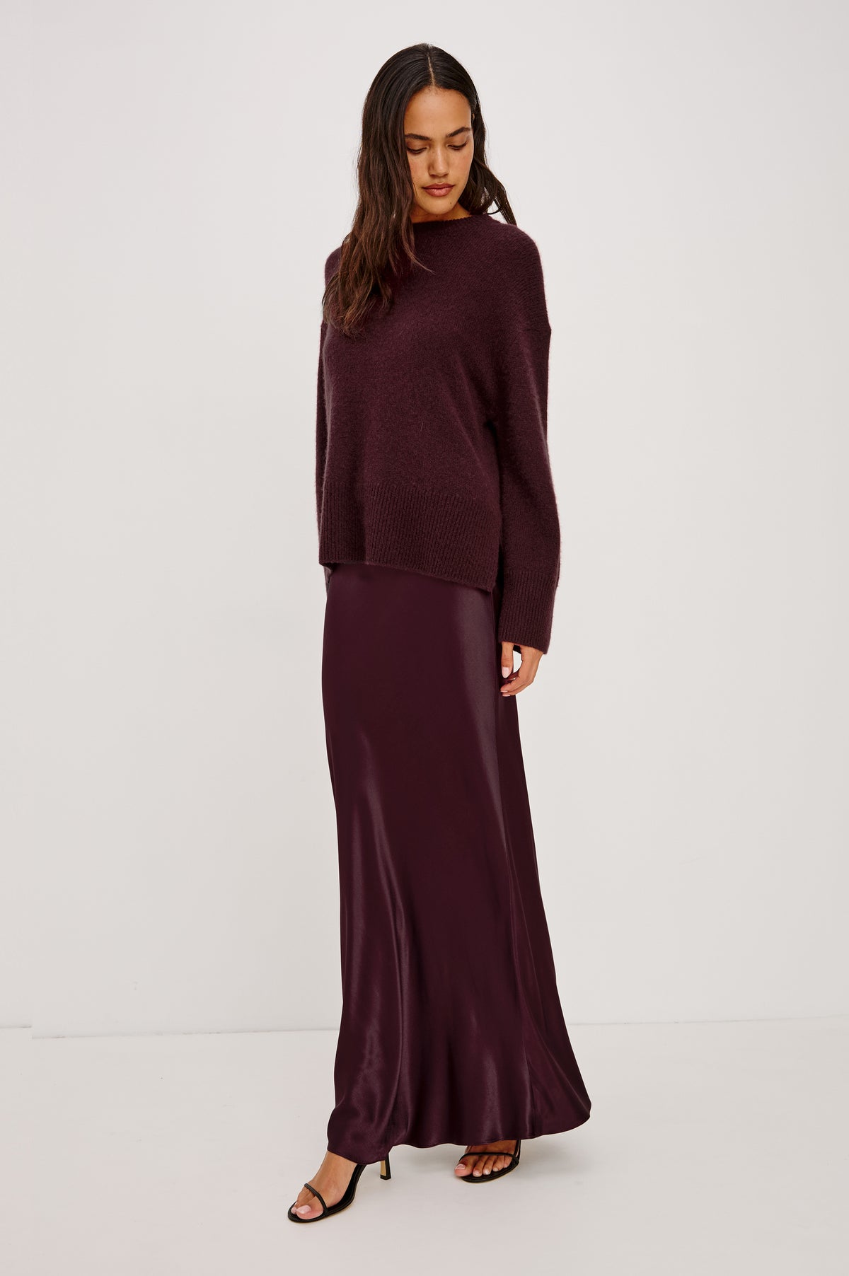 Miranda Sweater in Cashmere-Silk Blend With Relaxed Boxy Fit, Mock Neck, Drop Shoulders, and Side Slits at Hem in Wine Colorway - Front Full Body View Featured on Model