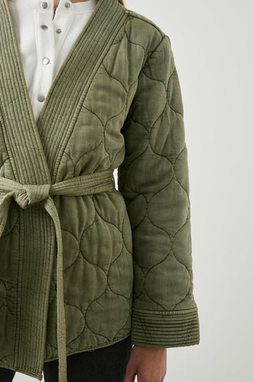 Monterey Quilted Jacket with Front Tie Closure, and Ribbed Trim in Washed Olive Colorway - Front View Featured on Model  
