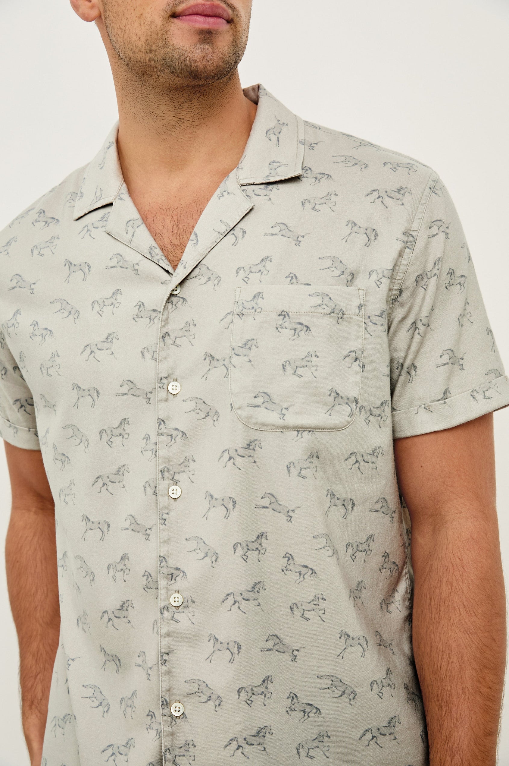 Moreno short sleeve button up shirt with camp collar and chest pocket in Stallion Parchment Indigo pattern - close up of details on model