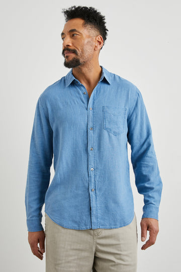 Mykonos Long-Sleeve Button Up with a Patch Pocket in Celsius Colorway, a blue - Front View Featured on Model