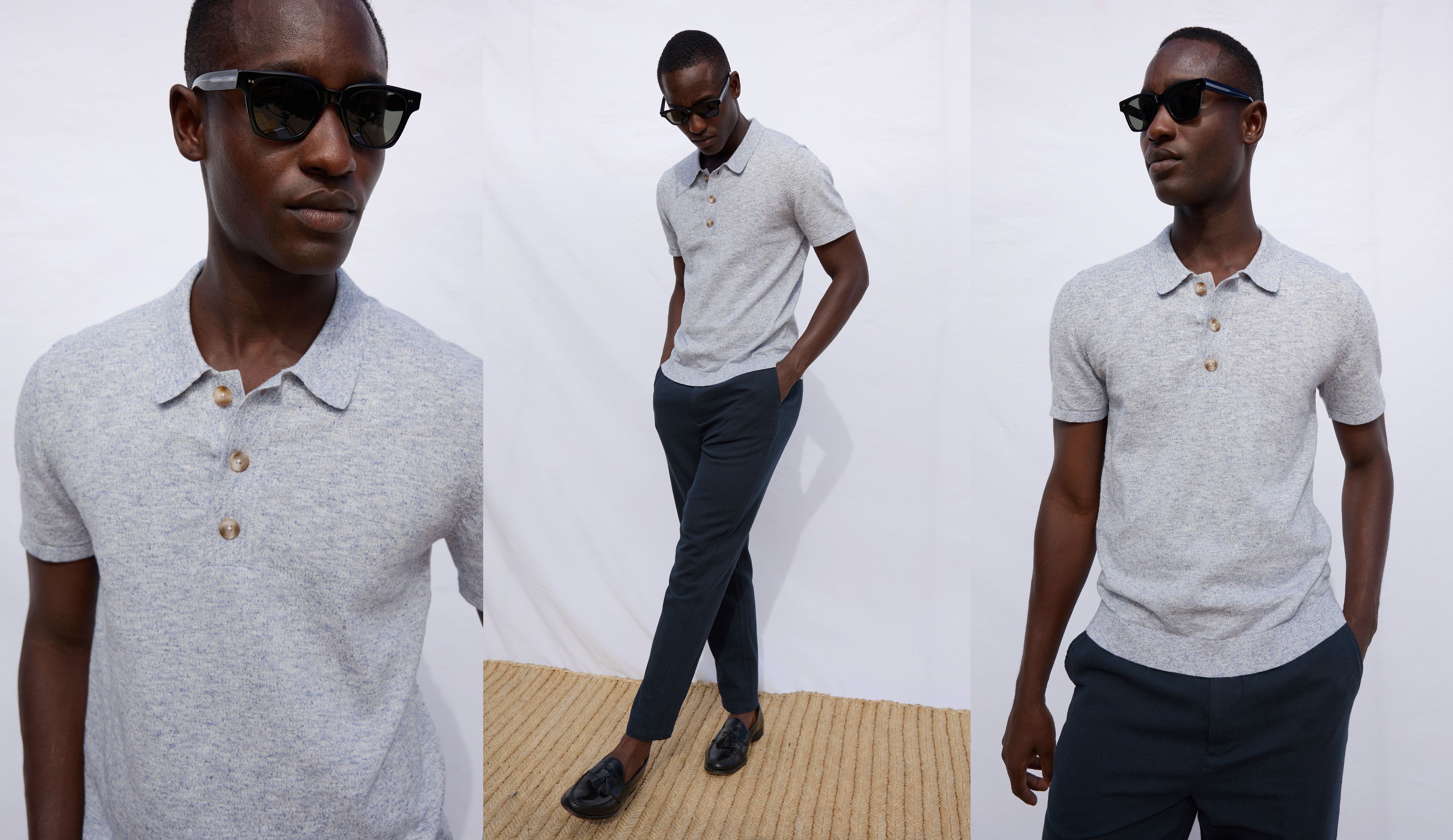 Man wearing a light gray polo shirt and dark pants against a white background