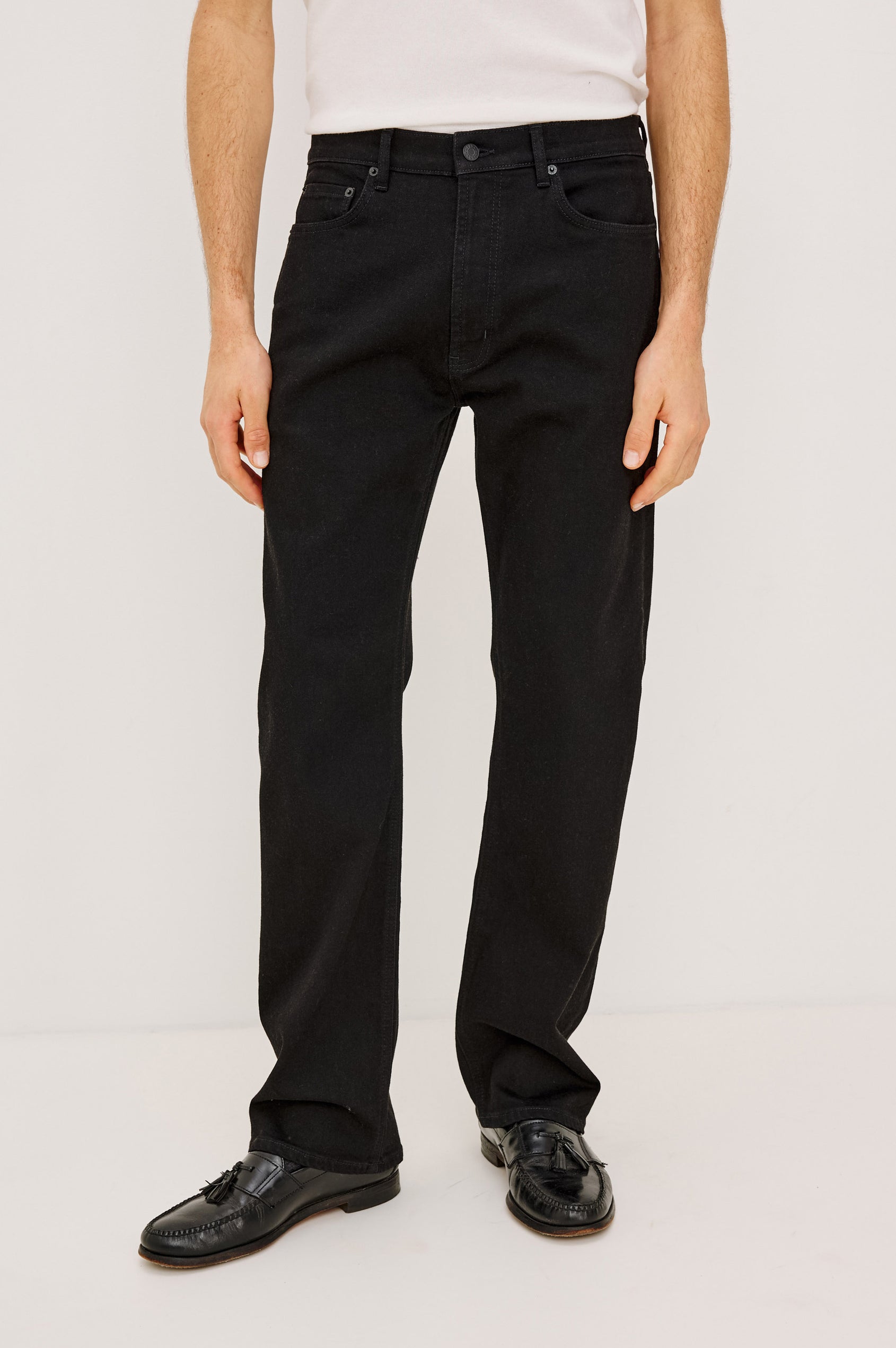 Nash Straight Leg Jean in Rigid Denim With Vintage-Inspired Button Fly in Dark Black Colorway - Front view featured on model.