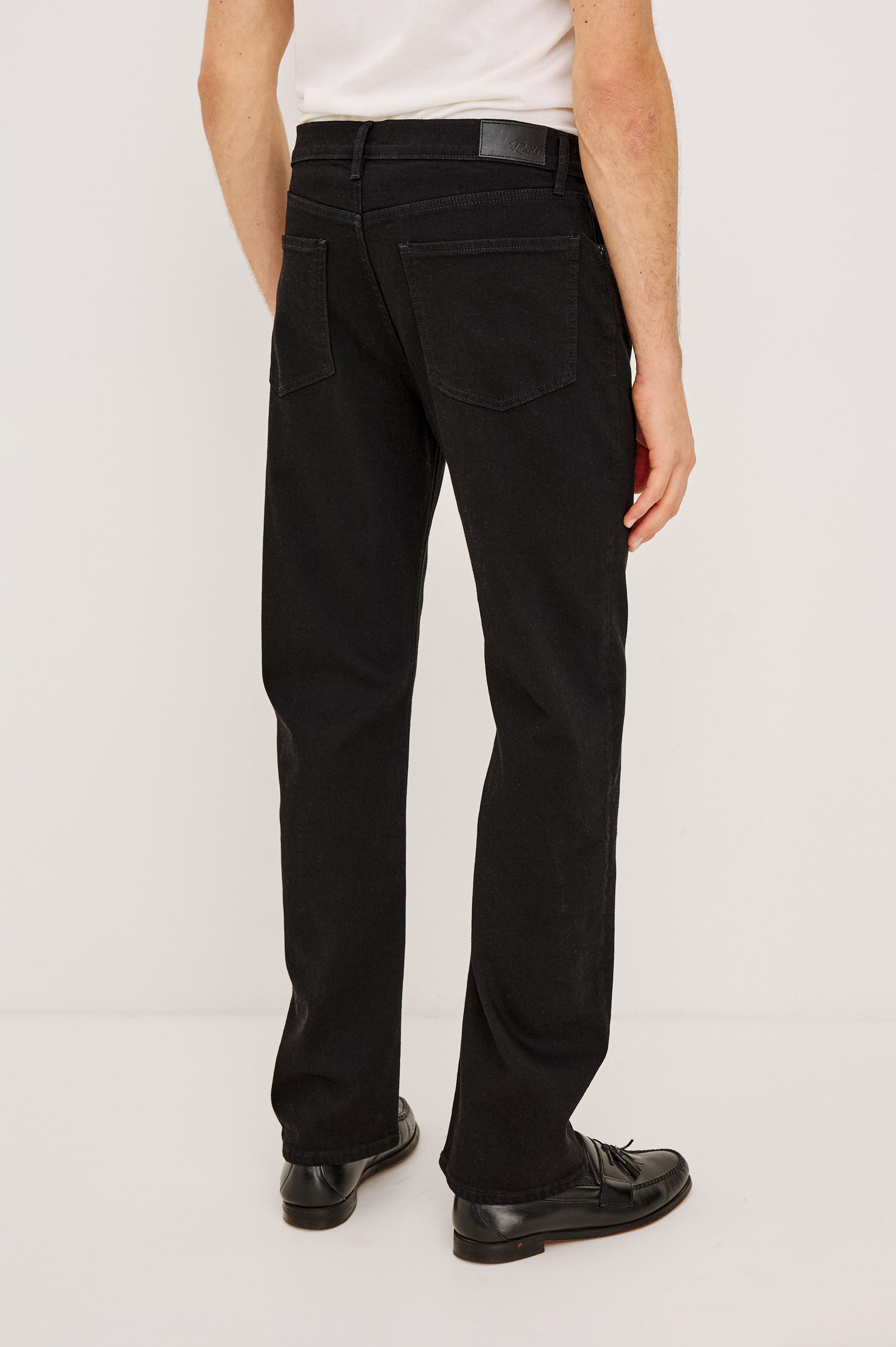 Nash Straight Leg Jean in Rigid Denim With Vintage-Inspired Button Fly in Dark Black Colorway - Back view featured on model.