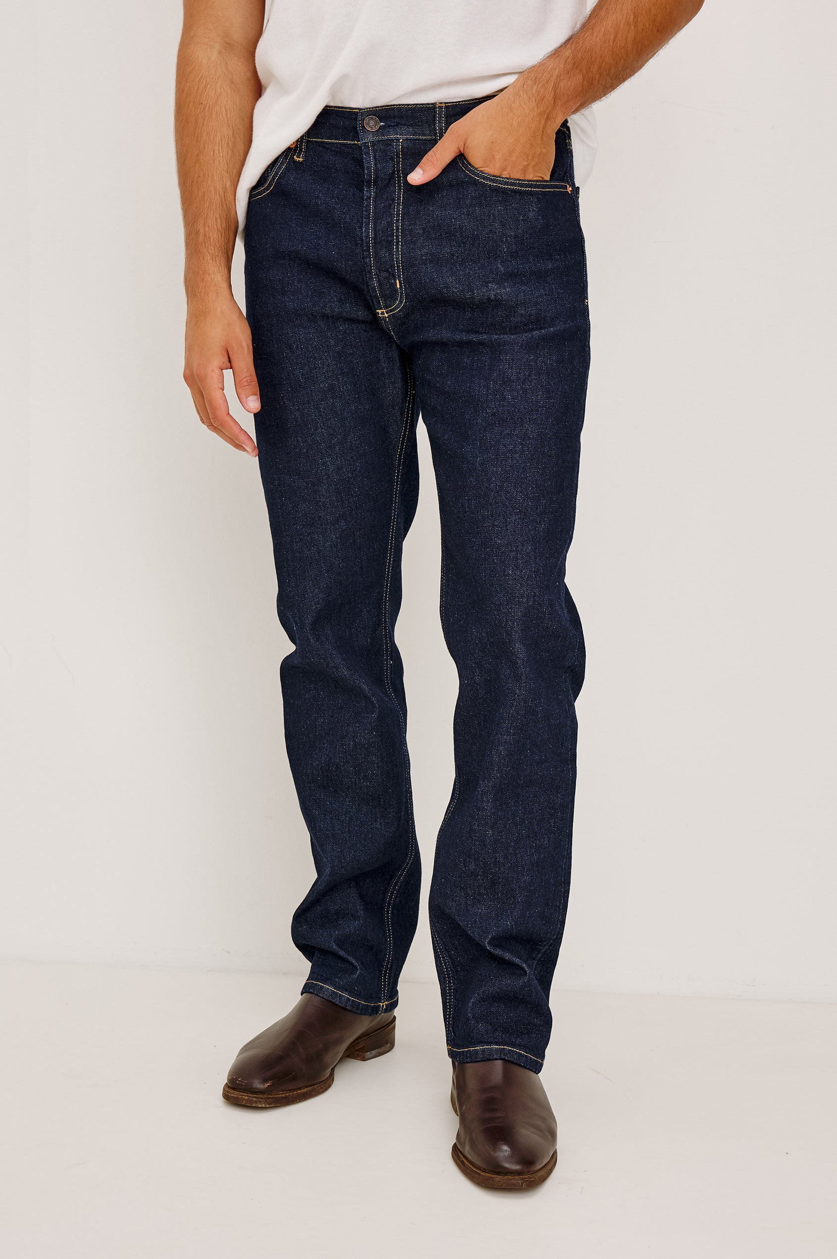 Nash Straight Leg Jean in Comfort Strech Denim With 5-Pockets and Front Zip Fly in Rinse Wash Colorway - Lower Body Front View Featured on Model