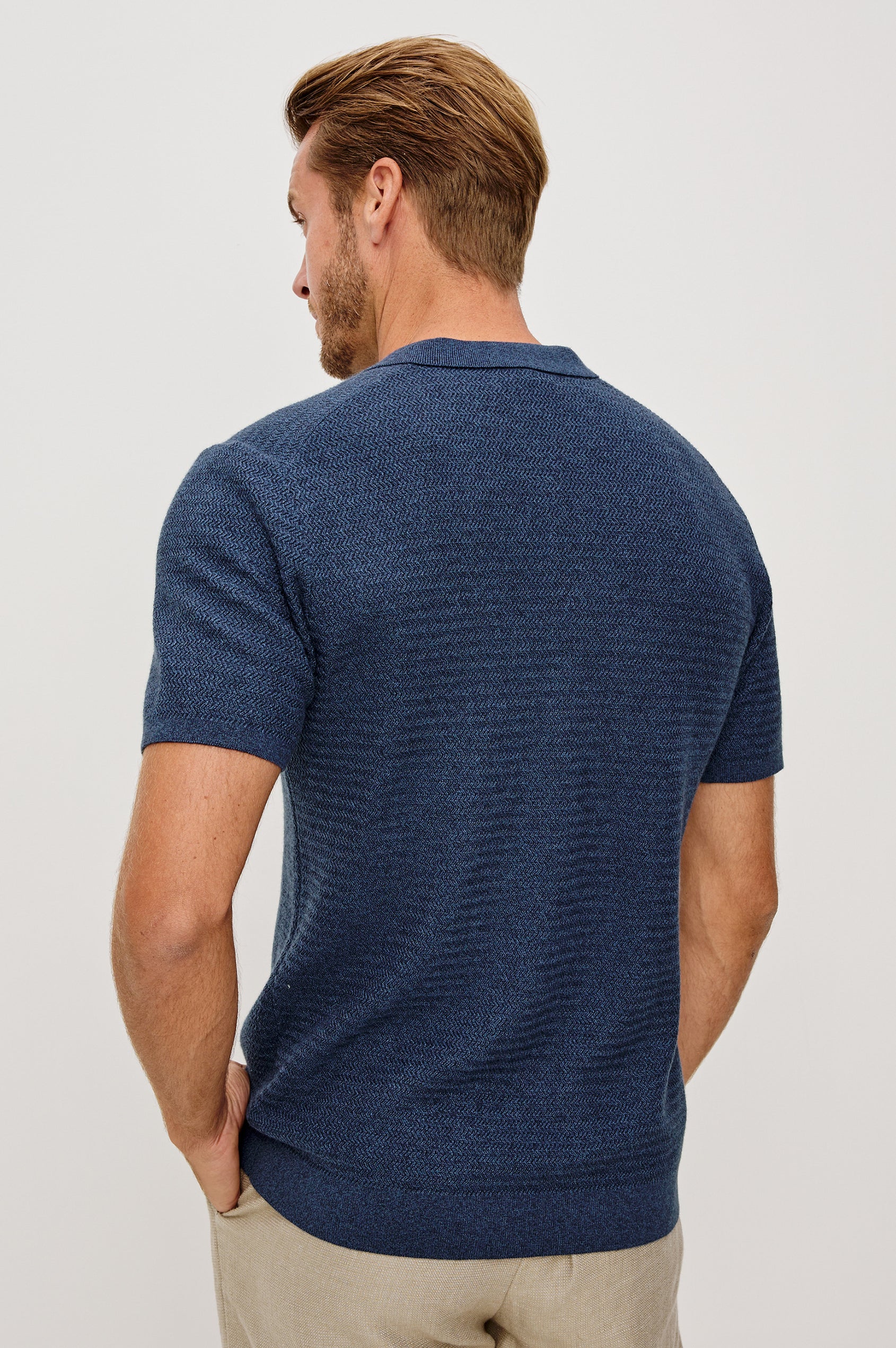 Nathan Polo Shirt in Cotton Blend Knit With Collar, Quarter Button Placket, and Short Sleeves in Harbour Colorway - Upper Body Back View Featured on Model