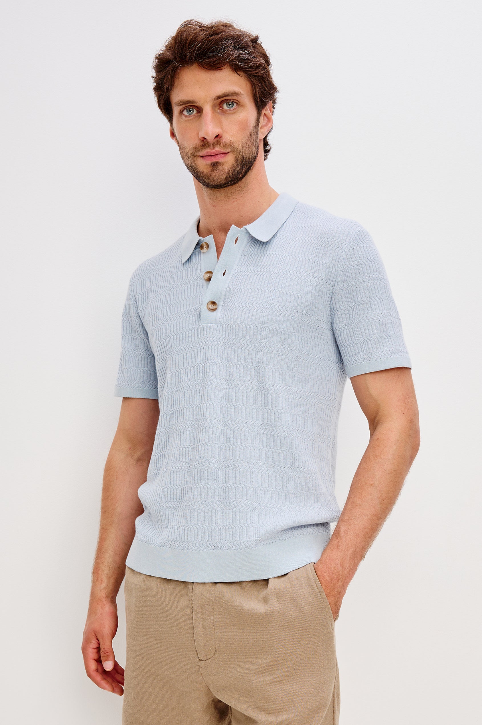 Nathan Short-Sleeve Polo Shirt with a Three-Button Placket and a Jacquard Pattern in Skyway Colorway - Front View Featured on Model