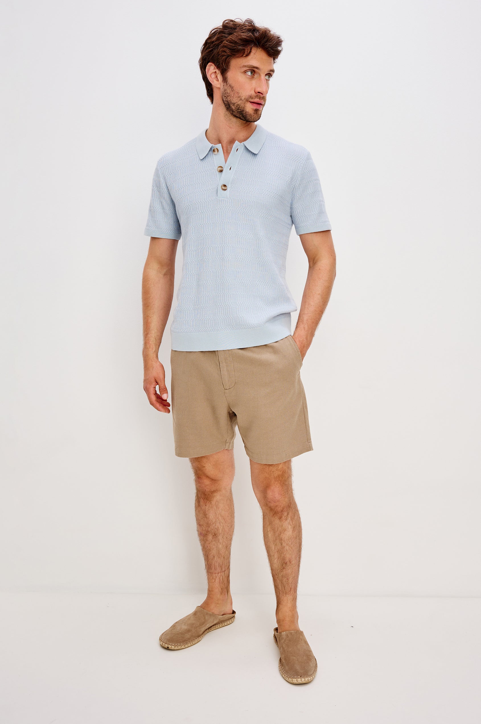 Nathan Short-Sleeve Polo Shirt with a Three-Button Placket and a Jacquard Pattern in Skyway Colorway - Front Full Body View Featured on Model