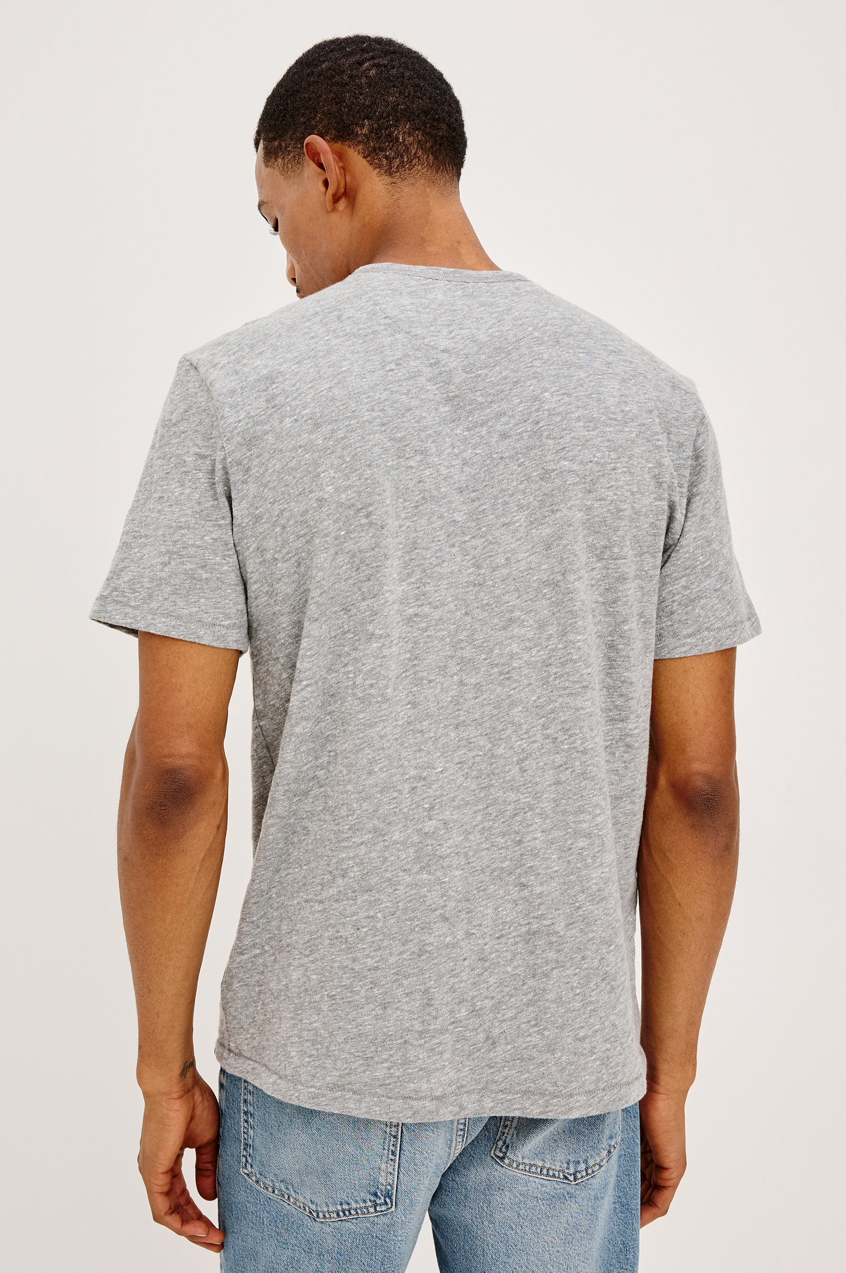 Neil Tee in Slub Cotton Jersey With Classic Fit, Short Sleeves, and Crewneck in Heather Grey Colorway - Upper Body Back View Featured on Model