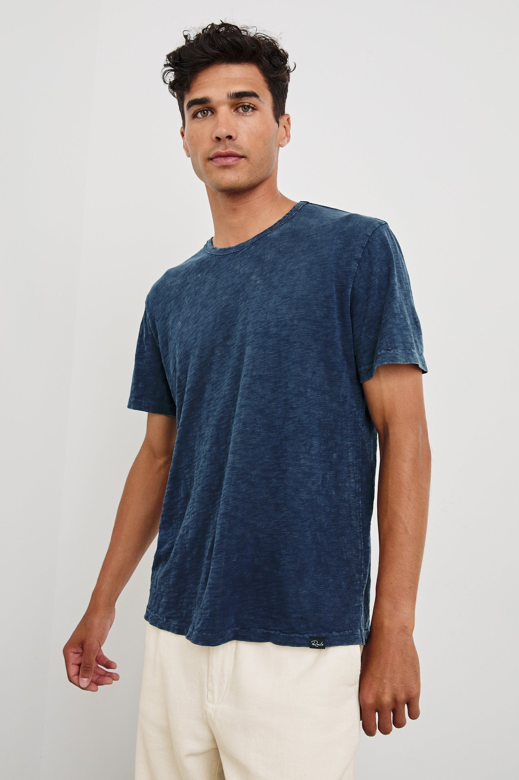 Neil cotton jersey crewneck t-shirt in Vintage Indigo - front view on model