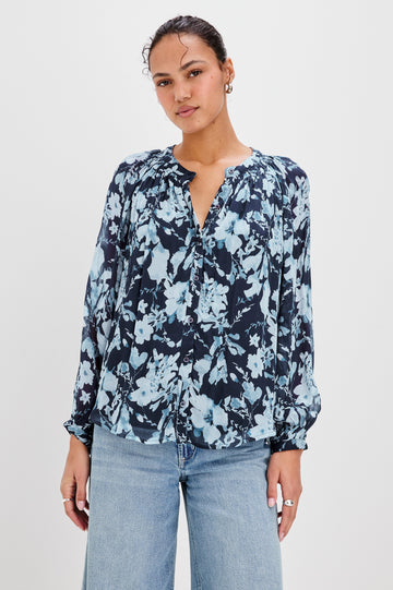Nessie Long Sleeve Top with Front Button Closure and Ruching along the Neckline in Indigo Blossoms Colorway, Flowers in Blue on Indigo - Front View Featured on Model 