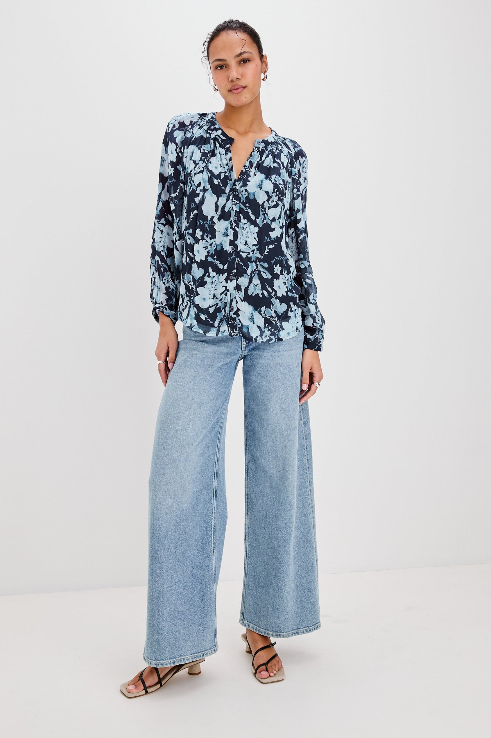 Nessie Long Sleeve Top with Front Button Closure and Ruching along the Neckline in Indigo Blossoms Colorway, Flowers in Blue on Indigo - Front Full Body View Featured on Model 