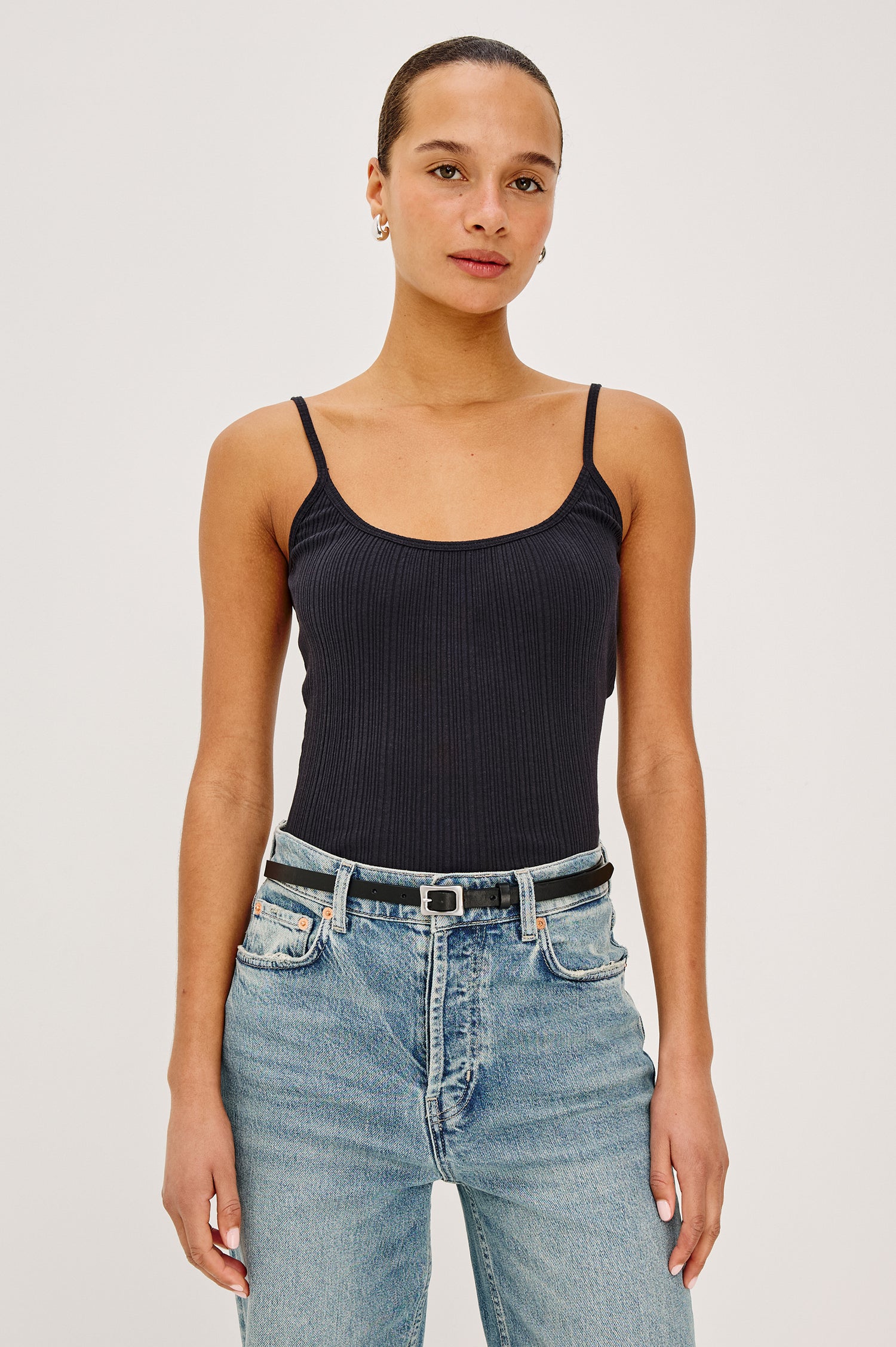 Nila Scoop Neck Fitted Tank Top With Ribbed Texture in Black Colorway - Upper Body Front View Featured on Model