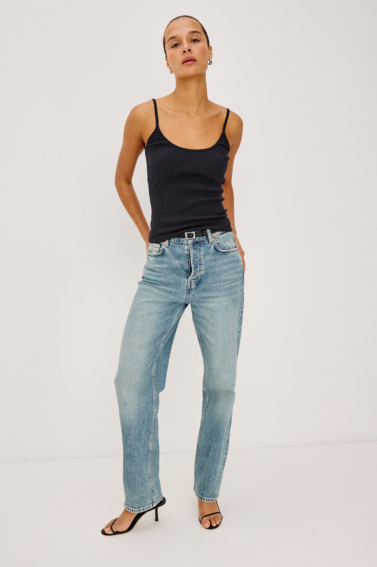 Nila Scoop Neck Fitted Tank Top With Ribbed Texture in Black Colorway - Upper Body Front View Featured on Model