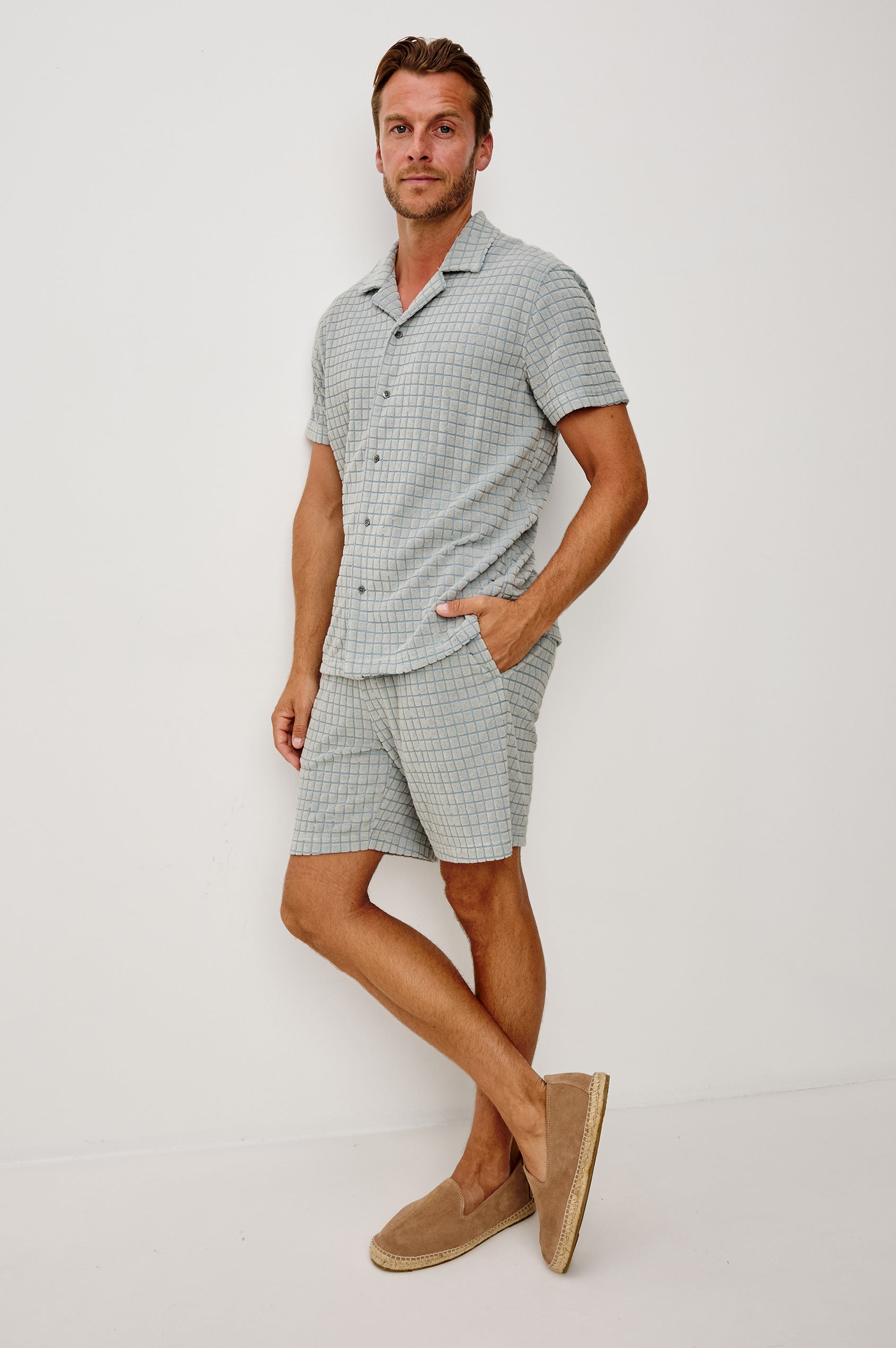 Nova Short in French Terry With Raised Jacquard Pattern, Side Pockets, and Drawstring Waist Ties in Silver Line Grid Colorway - Full Body Front View Featured on Model