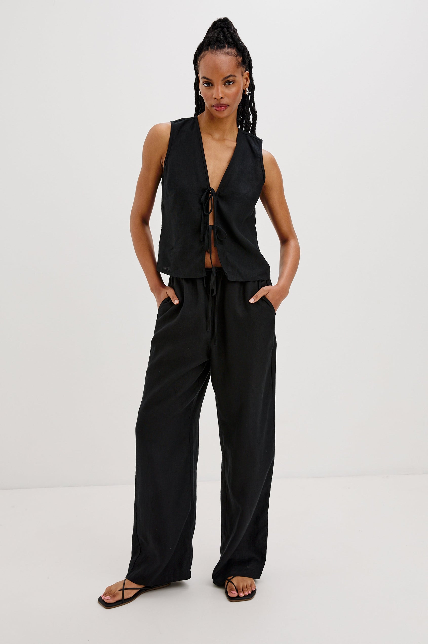 Oregon Sleeveless Vest Top with Tie Front in Black Colorway. Full Body Front View Shown on Model.