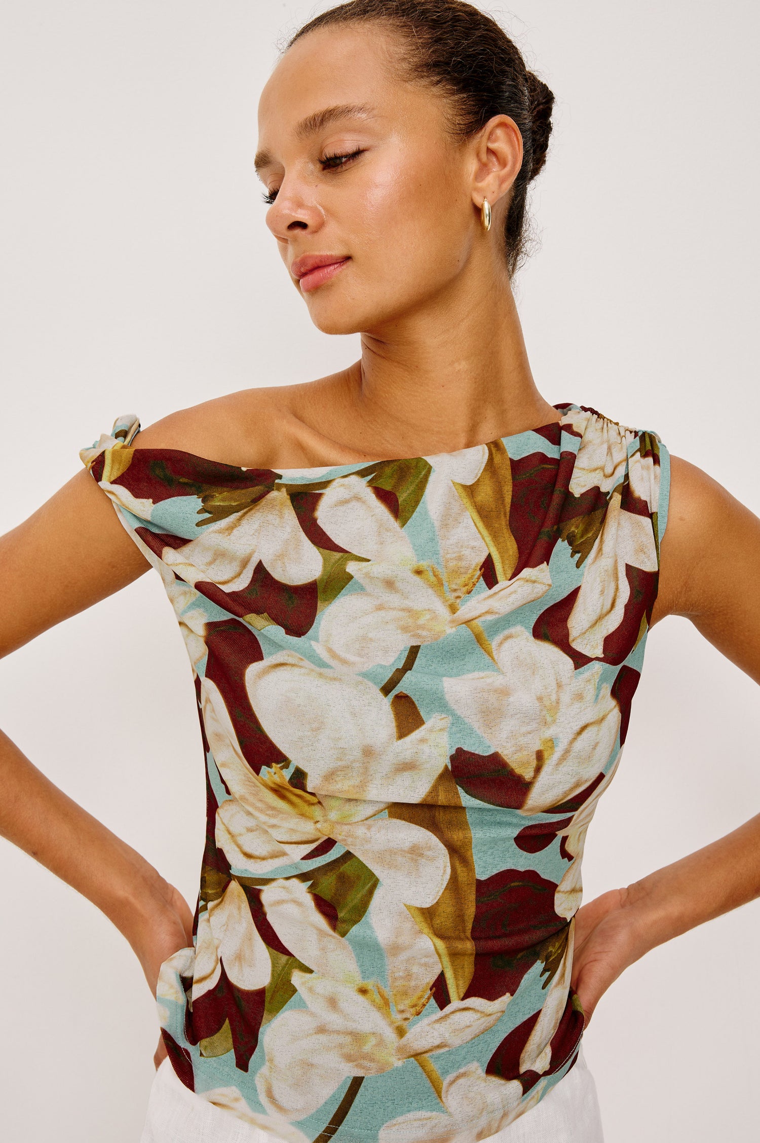 Orelia Fitted Top in Self-Lined Mesh With Twisted Shoulder Straps, and Asymmetrical One Shoulder Neckline in Plumeria Colorway - Upper Body Front View Featured on Model