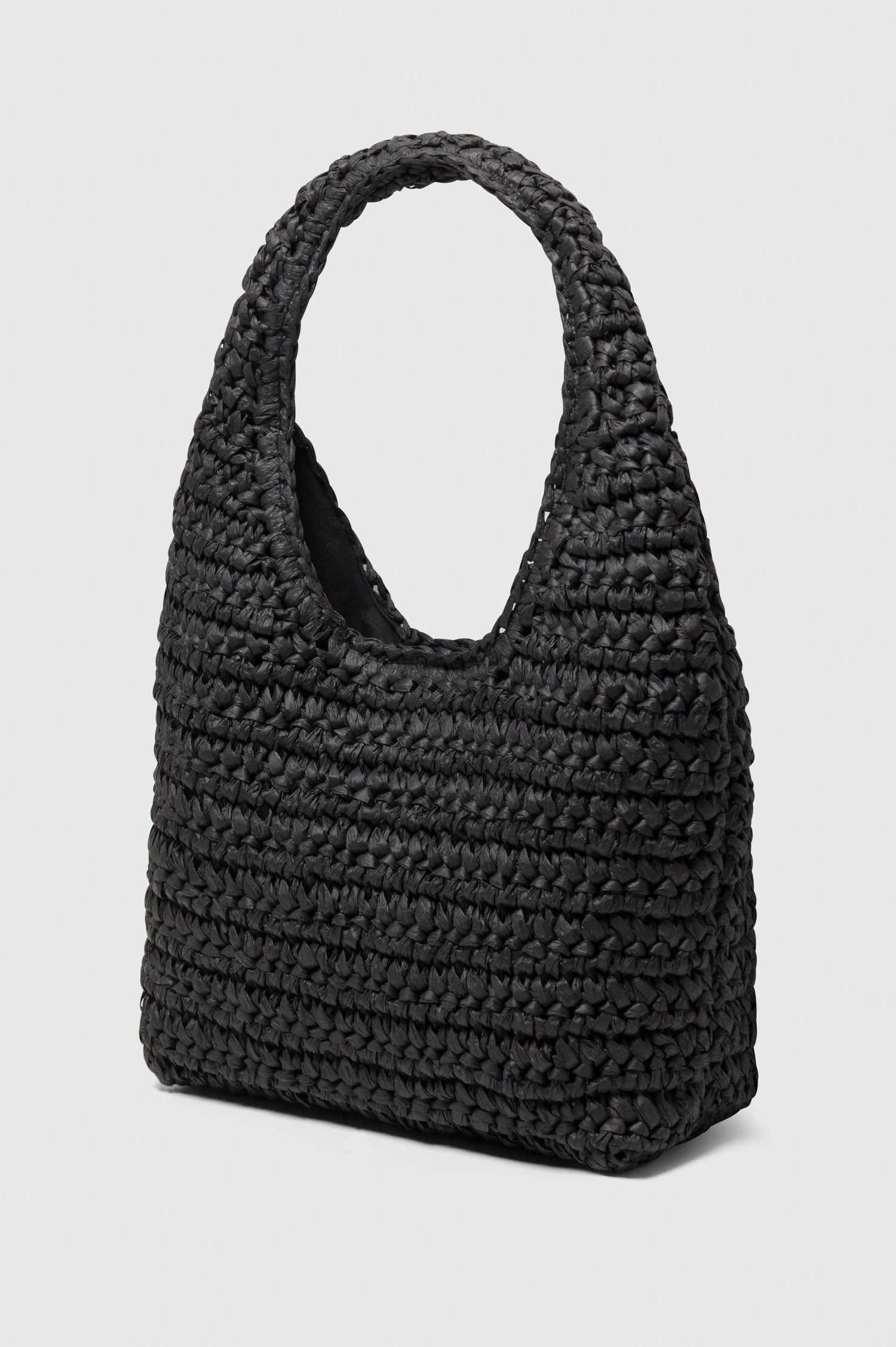 Palma rattan woven shoulder bag in Black - side view