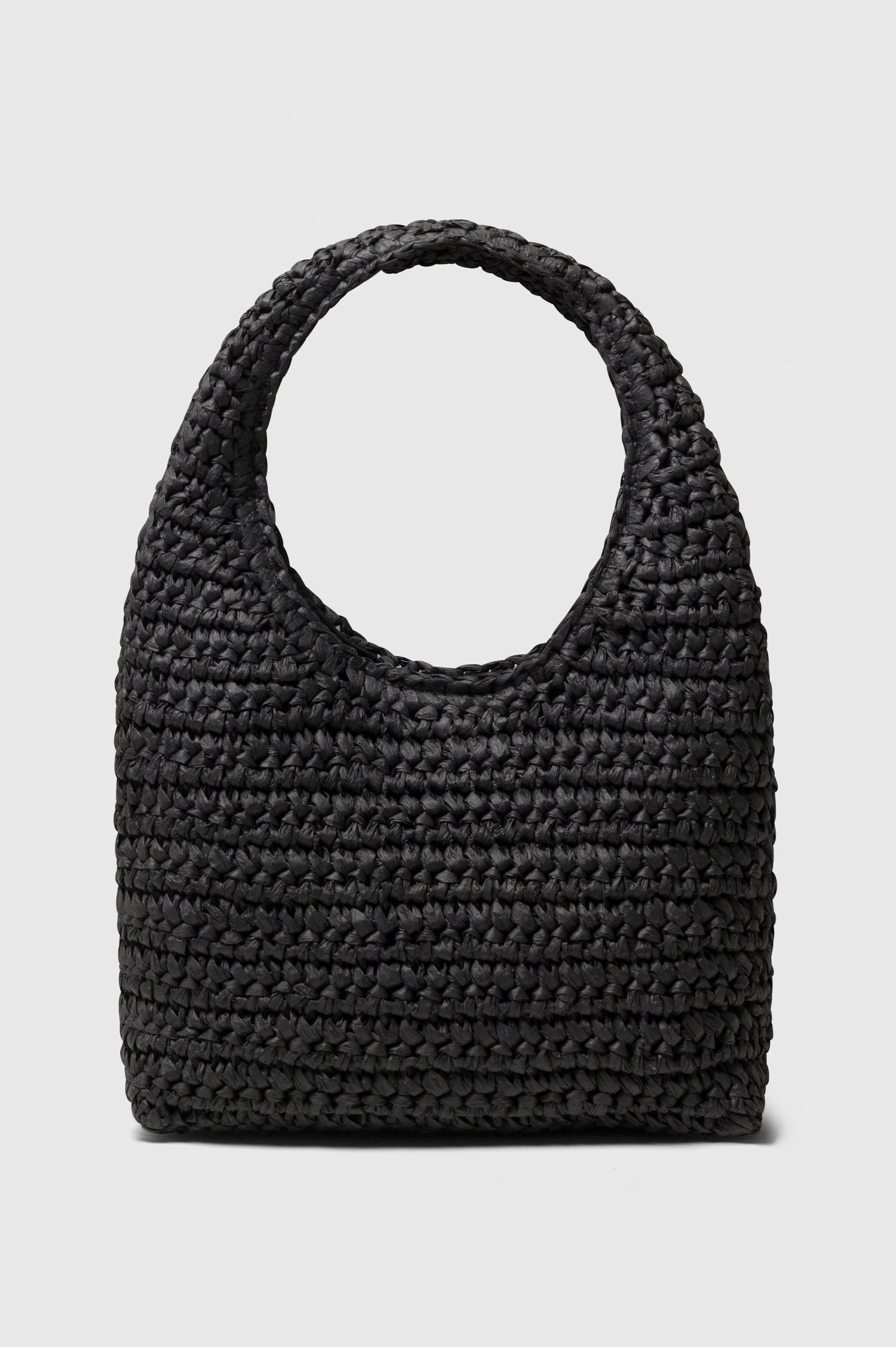 Palma rattan woven shoulder bag in Black - front view
