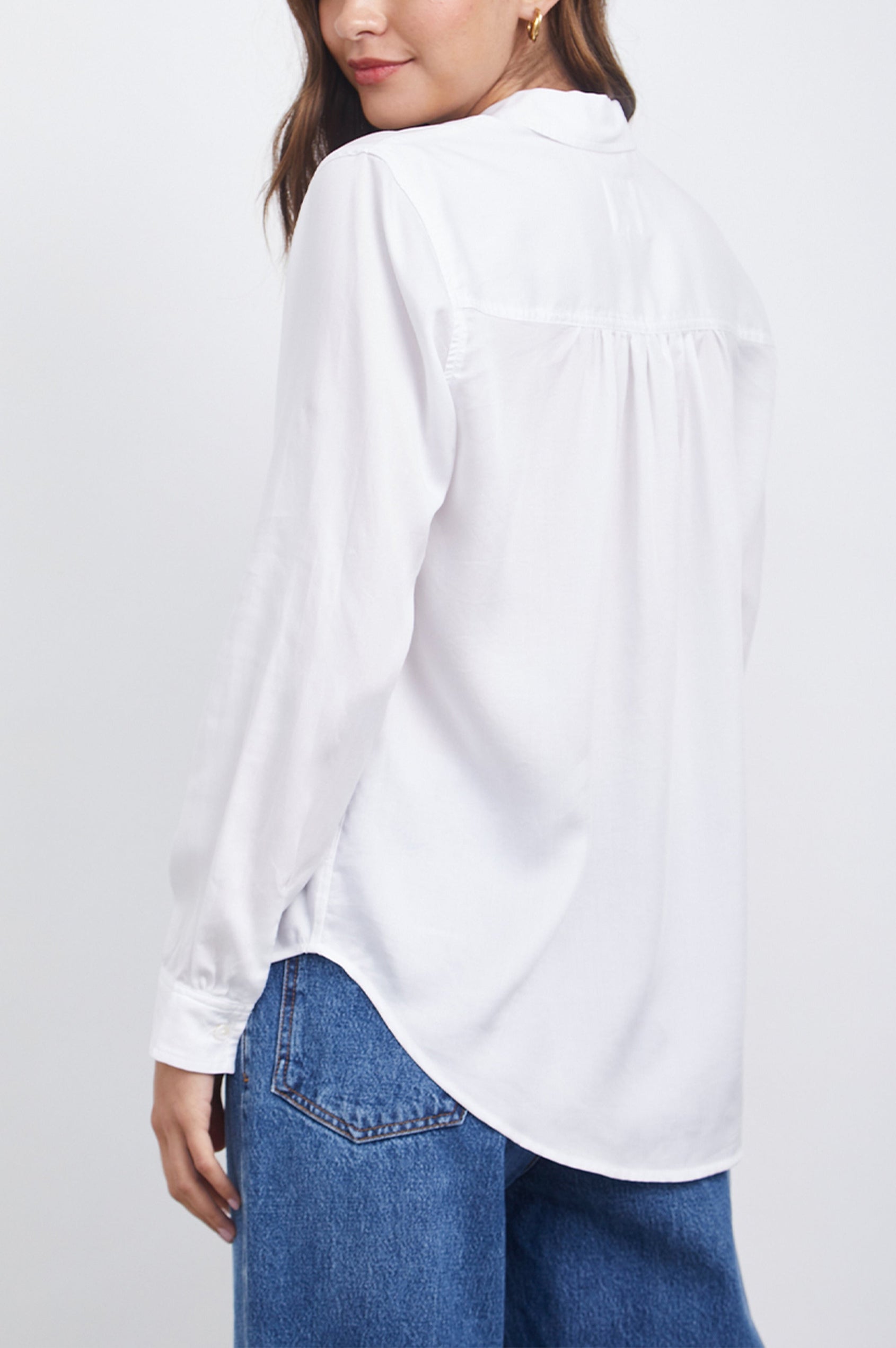 Paloma Long-Sleeve Button Up with a Chest Patch Pocket in White Colorway - Back View Featured on Model 