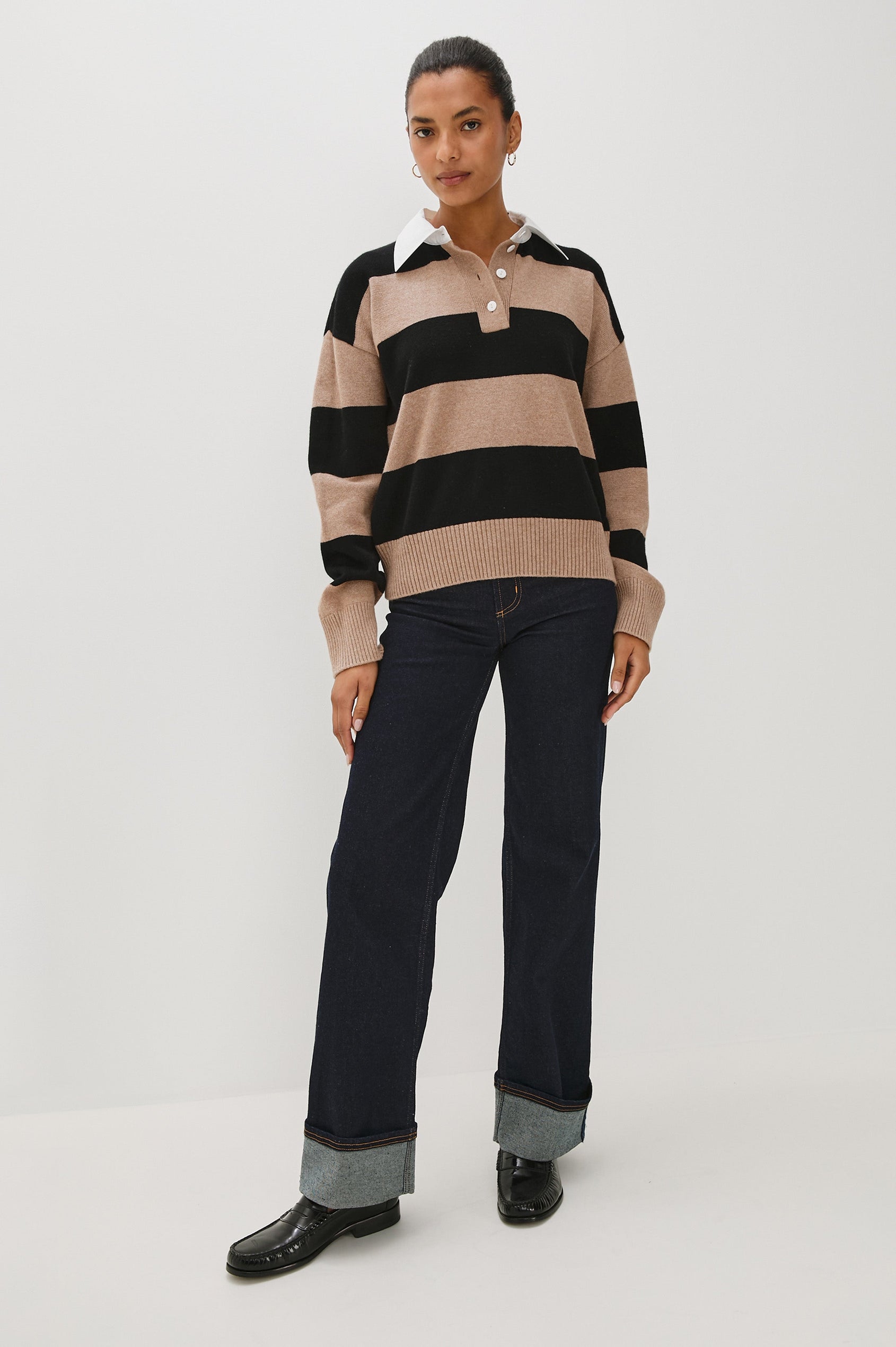Cotton-cashmere henley sweater with relaxed fit. Design features black heritage-style stripes and a contrasting white cotton poplin collar. Full Body Front view on model.