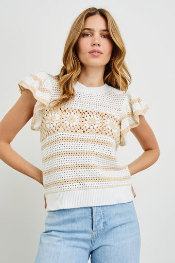 Penelope Crochet Top with Flutter Sleeves and Ribbed Hem in Ivory Oat Crochet Stripe Colorway, with contrasting knit flowers across the chest - Front View Featured on Model
