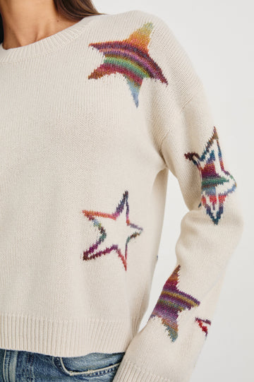 Perci Long-Sleeved Sweater with Crew Neck and Ribbed Trim in Ivory Rainbow Multi Stars Colorway, Rainbow Stars on Ivory - Front View Featured on Model